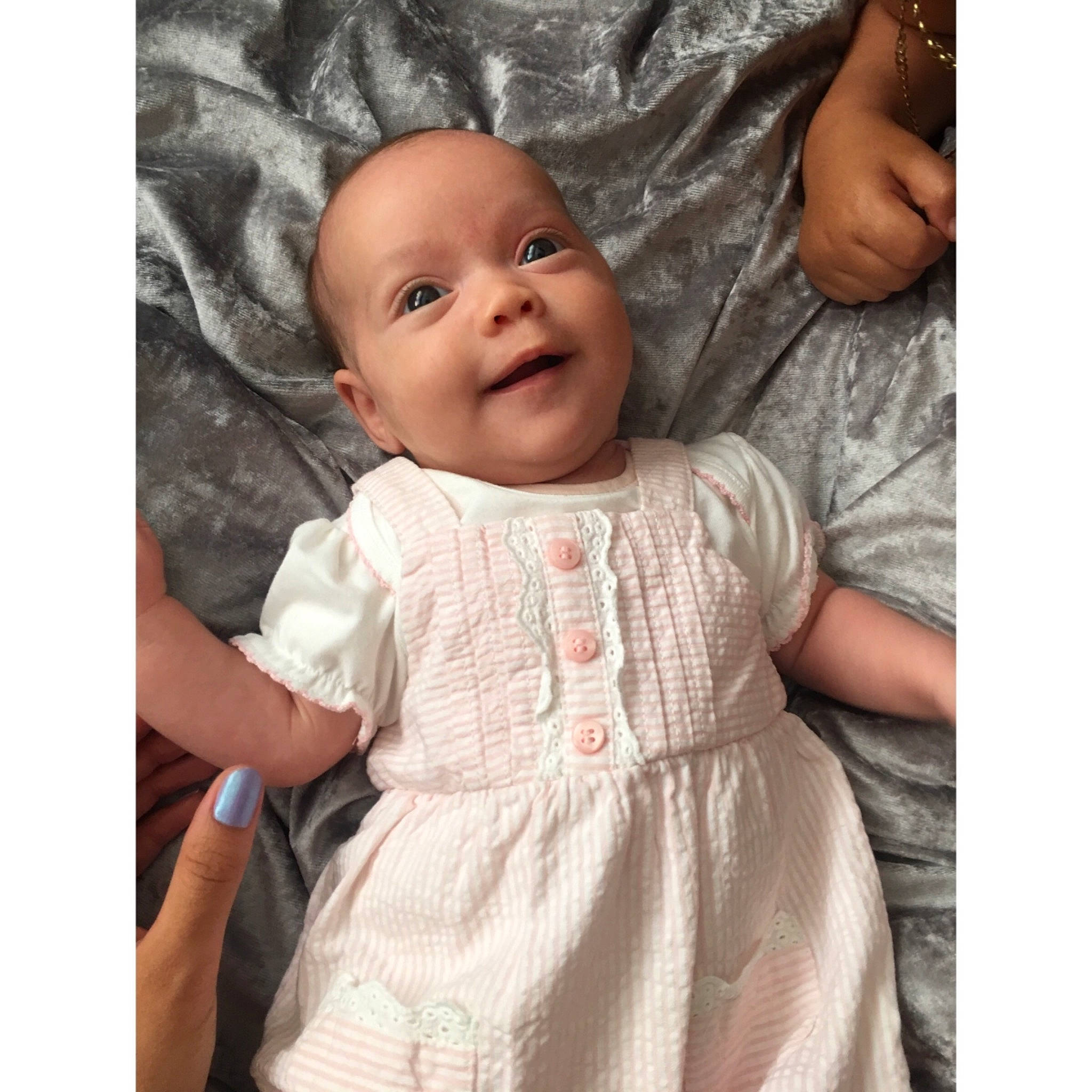 Amaisia joined the competition — help win amazing prizes! arm, baby, beauty, beige, cheek, child, design, dress, face, hand, head, outerwear, pattern, person, product, skin, sleeve, smile, t_shirt, toddler