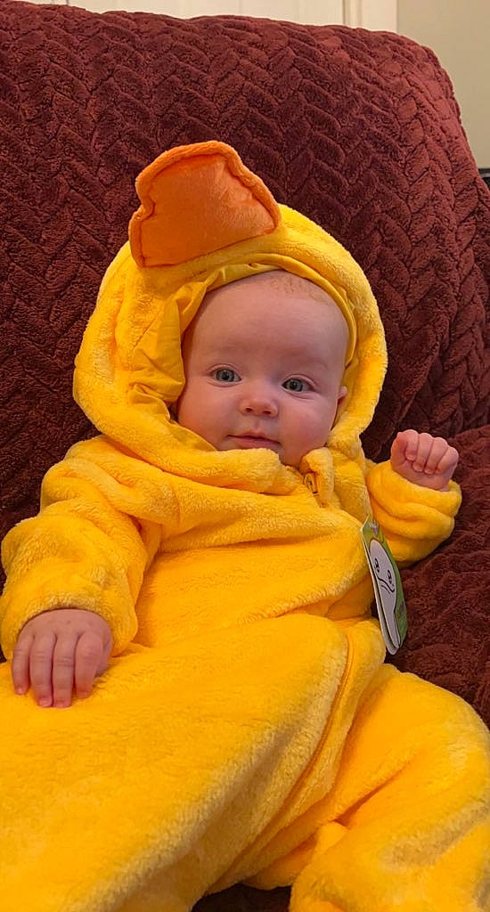 Kinsley is registered to the contest to win money with this photo: baby, baby_products, baby_sleeping, baby_toddler_clothing, bedtime, cheek, child, chin, comfort, face, fun, fur, linens, orange, outerwear, person, sitting, skin, sleeve, toddler