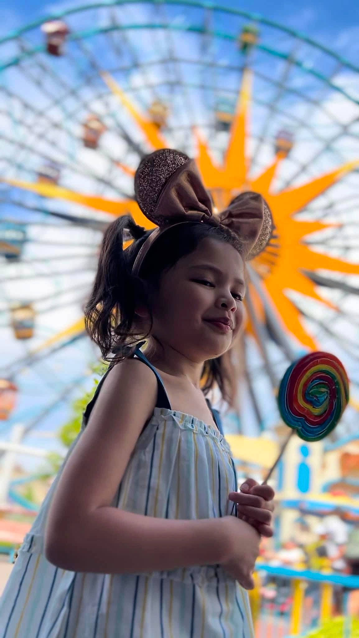 Savannah is registered to the contest to win money with this photo: auto_part, automotive_wheel_system, beauty, child, event, ferris_wheel, fun, happy, hat, leisure, nonbuilding_structure, person, photograph, public_space, recreation, smile, snapshot, spring, summer, toddler