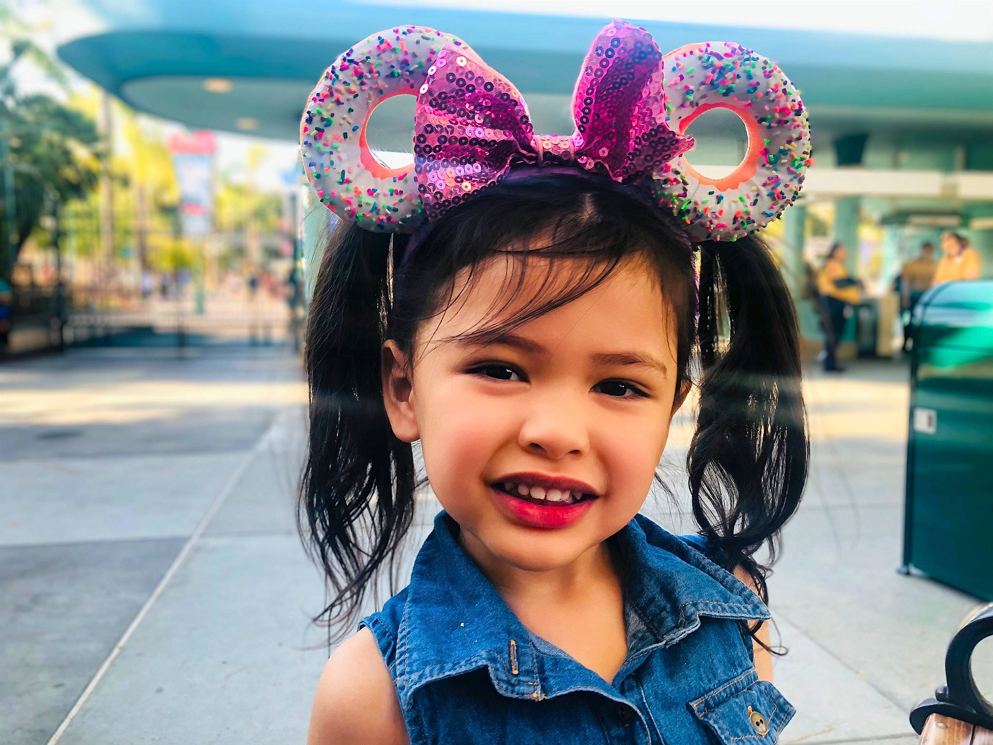 Savannah is registered to the contest to win money with this photo: beauty, black, black_hair, blue, chin, ear, fun, green, happy, headgear, headpiece, joy, leisure, light, magenta, person, photograph, pink, smile, summer