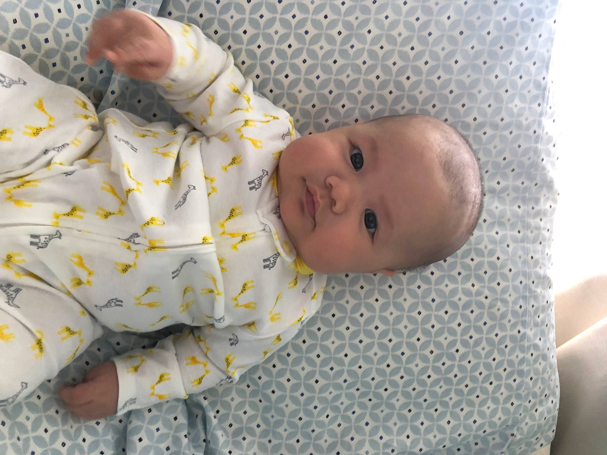 Otani Tovia Jr. is registered to the contest to win money with this photo: baby, baby_products, baby_safety, baby_sleeping, baby_toddler_clothing, bedding, bedtime, child, comfort, head, linens, nightwear, pattern, person, room, sleep, sleeve, smile, toddler, white