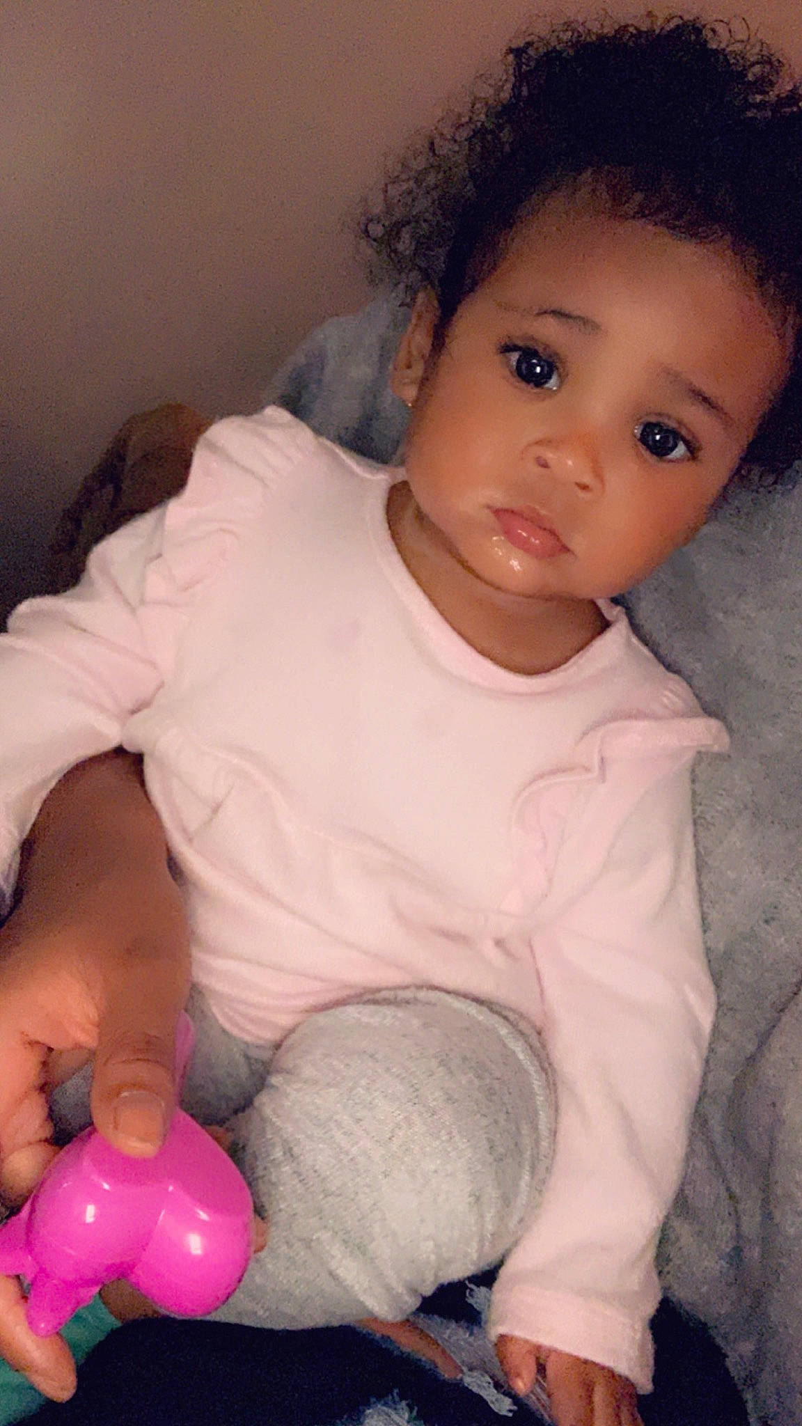 Ariya is registered to the contest to win money with this photo: arm, baby_toddler_clothing, balloon, cheek, eye, eyebrow, eyelash, finger, hand, human_body, iris, joint, lip, mouth, nose, organ, person, pink, skin, sleeve