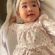 Sara joined the competition — help win amazing prizes! adorable, baby, blanket, close_up, cozy, crib_bedding, ear, eyelashes, hand, headband, heart_pattern, infant, large_eyes, looking_up, onesie, portrait, rosy_cheeks, smile, soft_lighting, swaddle