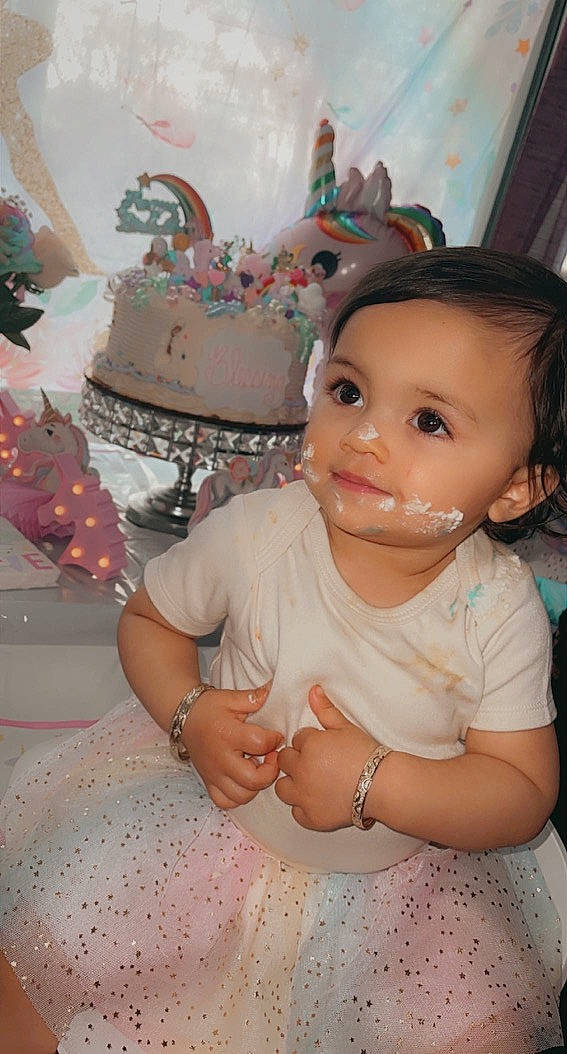 Blessing is registered to the contest to win money with this photo: baby, cake, cake_decorating, cheek, child, dessert, doll, dress, event, eyelash, fashion_accessory, happy, jewellery, peach, person, pink, sugar_cake, sweetness, toddler, toy