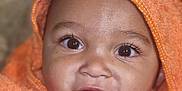 Nathanael participe au concours pour gagner de l'argent avec cette photo : baby, child, face, eyes, orange_towel, towel, wrapped, cute, smiling, portrait, close_up, skin, infant, happy, expression, soft_texture, indoor, young, adorable, head