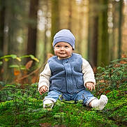 Gabin participe au concours pour gagner de l'argent avec cette photo : baby, child, cute, forest, greenery, hat, innocent, jeans, moss, nature, outdoor, plants, portrait, sitting, smile, socks, trees, vest, woodland, young