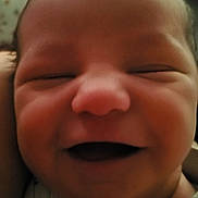 Harper joined the competition — help win amazing prizes! baby, newborn, smiling, face, closeup, infant, child, person, cute, happy, skin, head, clothing, portrait, young, joy, expression, sleepy, indoors, warm