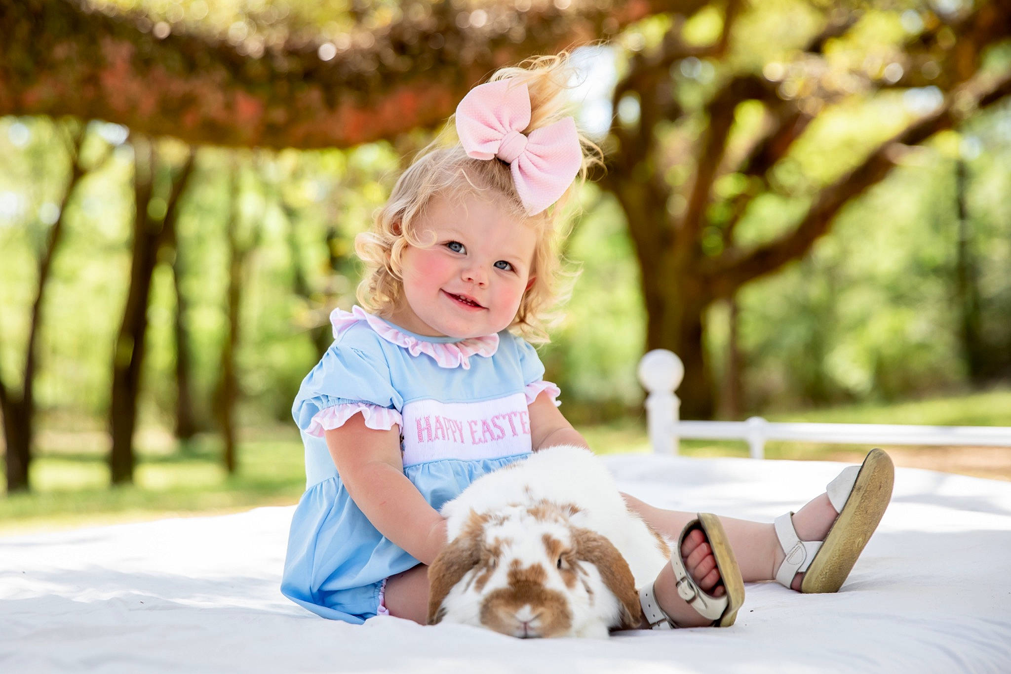 Breckyn is registered to the contest to win money with this photo: baby, baby_toddler_clothing, child, companion_dog, face, facial_expression, flash_photography, fun, grass, happy, headpiece, joy, leisure, mammal, person, plant, sitting, skin, smile, sunlight