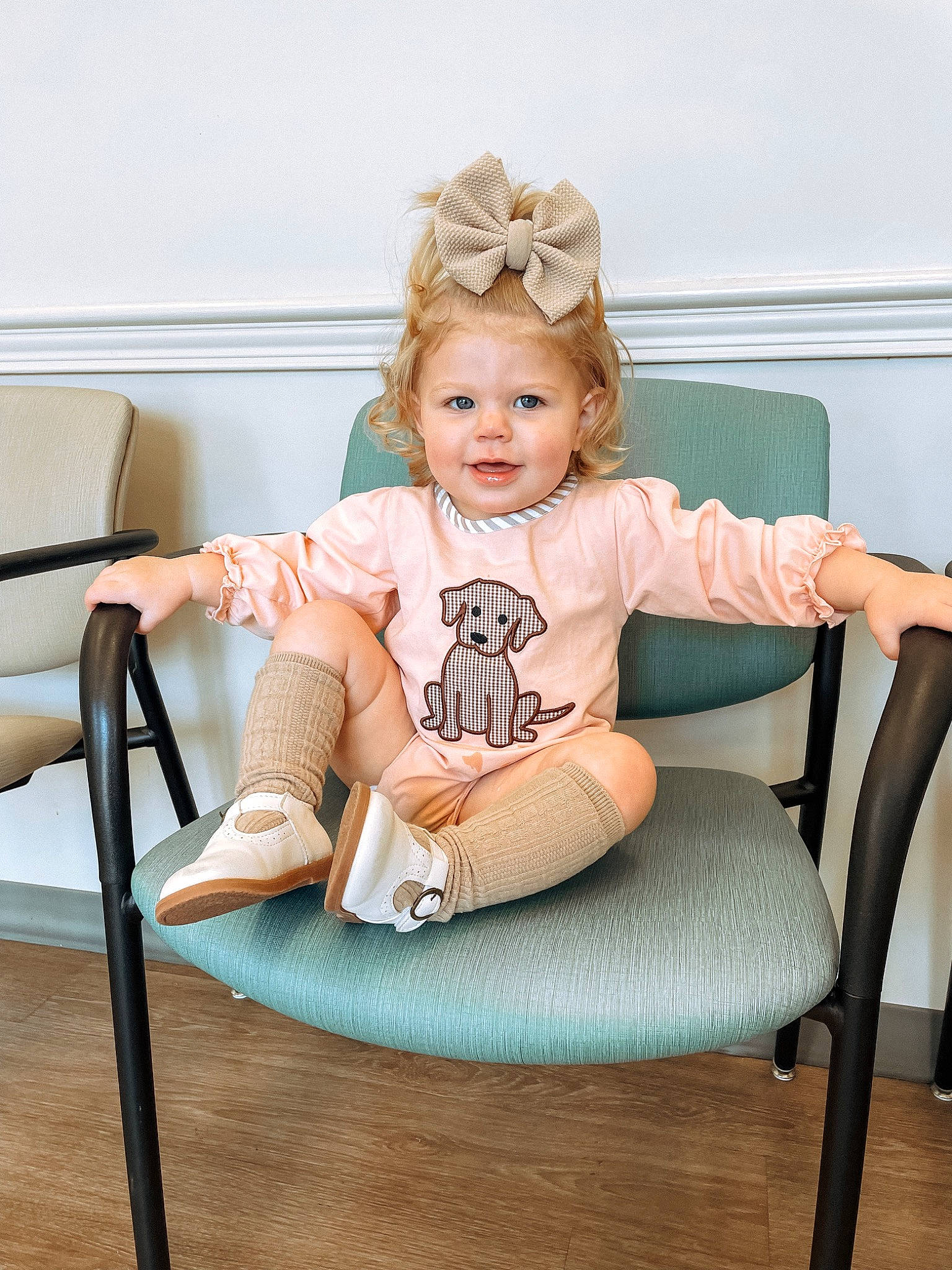 Breckyn is registered to the contest to win money with this photo: baby_toddler_clothing, chair, comfort, finger, floor, furniture, happy, joint, knee, leg, neck, person, shoe, shoulder, skin, sleeve, smile, sock, standing, thigh