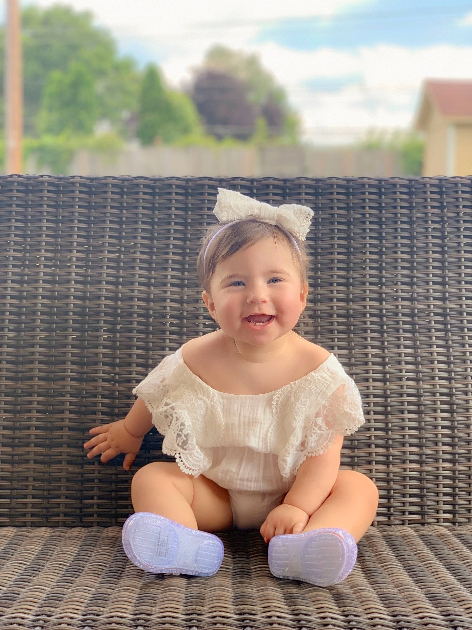 Camila is registered to the contest to win money with this photo: baby, baby_toddler_clothing, child, fashion_accessory, flooring, fun, grass, happy, human_leg, joy, leisure, pattern, person, skin, sky, sleeve, smile, sock, thigh, toddler