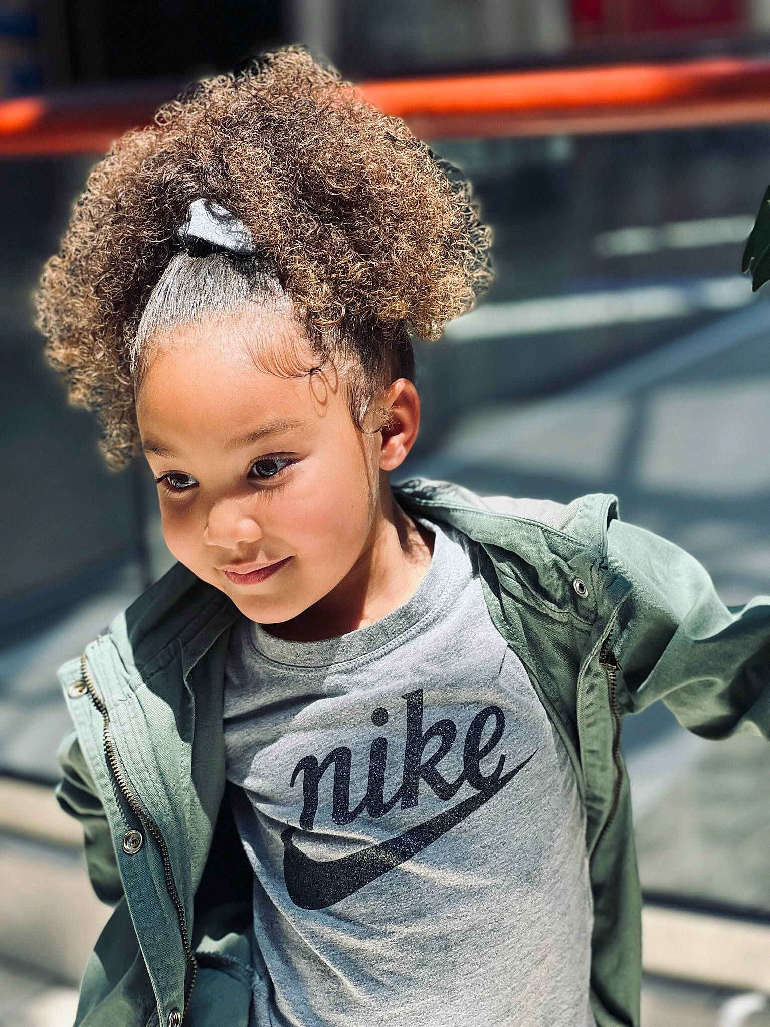 Aaliyah is registered to the contest to win money with this photo: afro, audio_equipment, black_hair, child, child_model, eyewear, flash_photography, fun, fur, happy, jewellery, jheri_curl, person, portrait_photography, road, sitting, sleeve, street, t_shirt, toddler