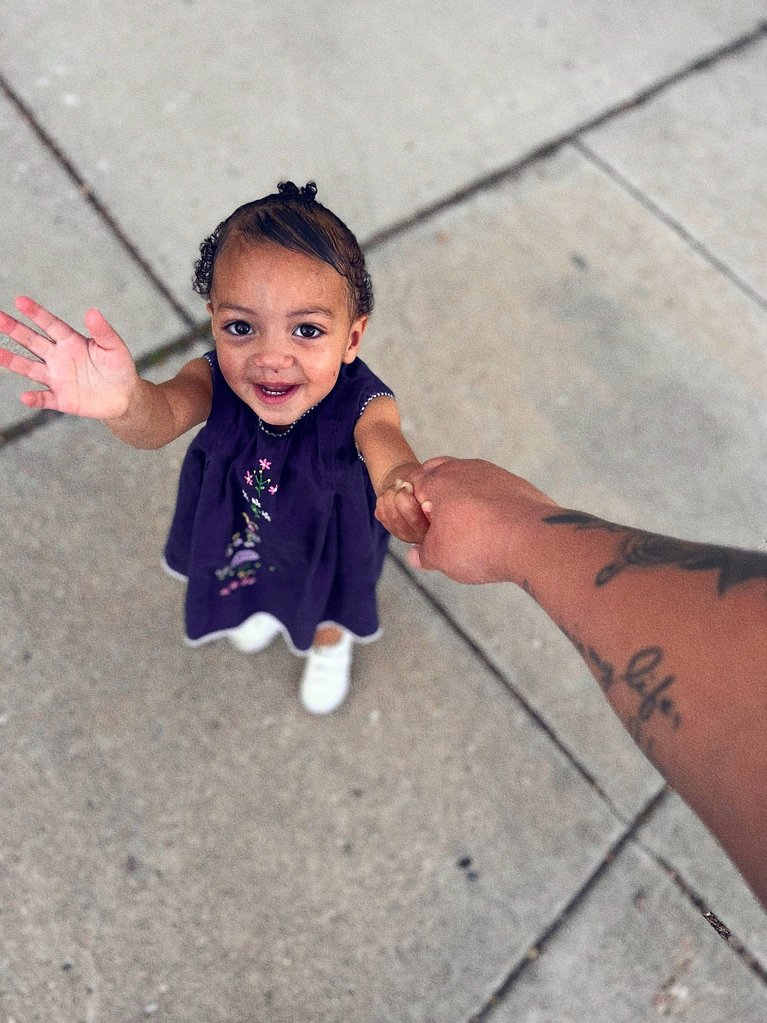 Selena joined the competition — help win amazing prizes! asphalt, child, elbow, finger, flooring, foot, gesture, hand, happy, human_leg, joint, joy, person, recreation, road_surface, skin, sleeve, smile, temporary_tattoo, thigh