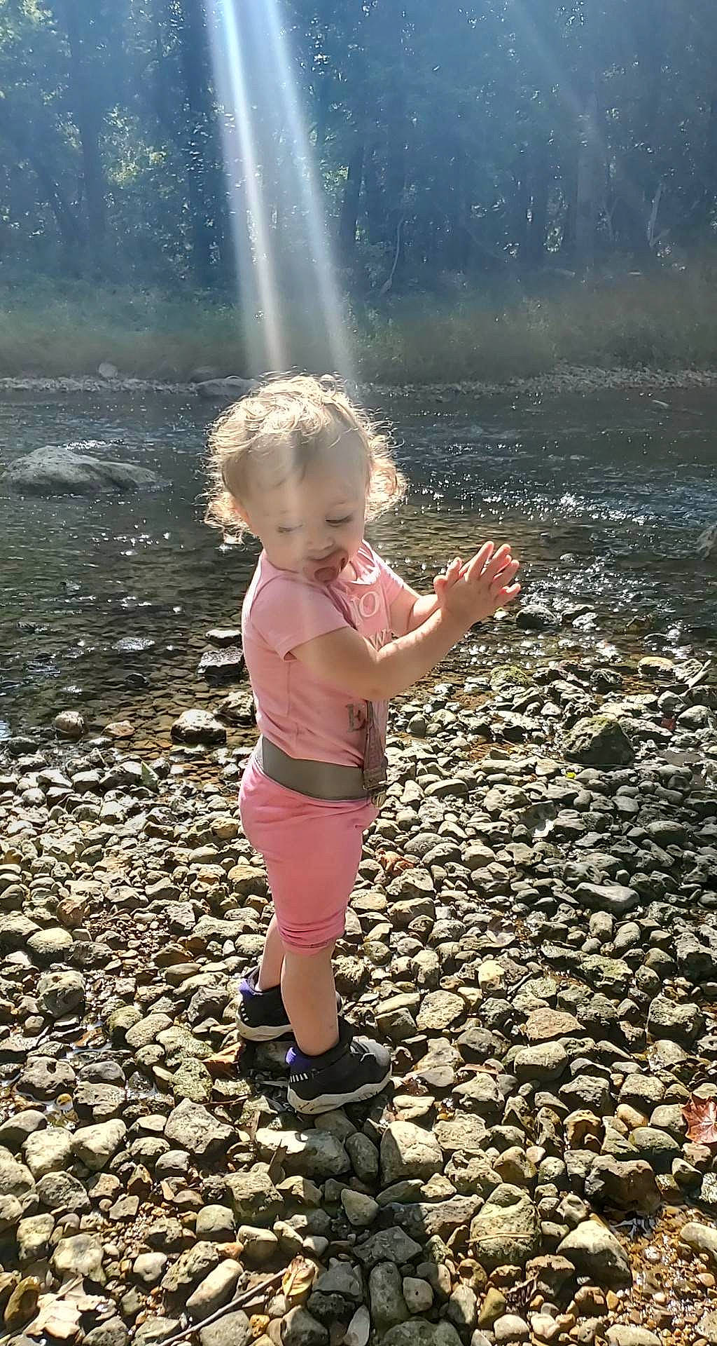 Renesimae joined the competition — help win amazing prizes! asphalt, body_of_water, child, flash_photography, flooring, fun, grass, happy, landscape, leisure, people_in_nature, person, play, reflection, road_surface, rock, soil, spring, standing, toddler