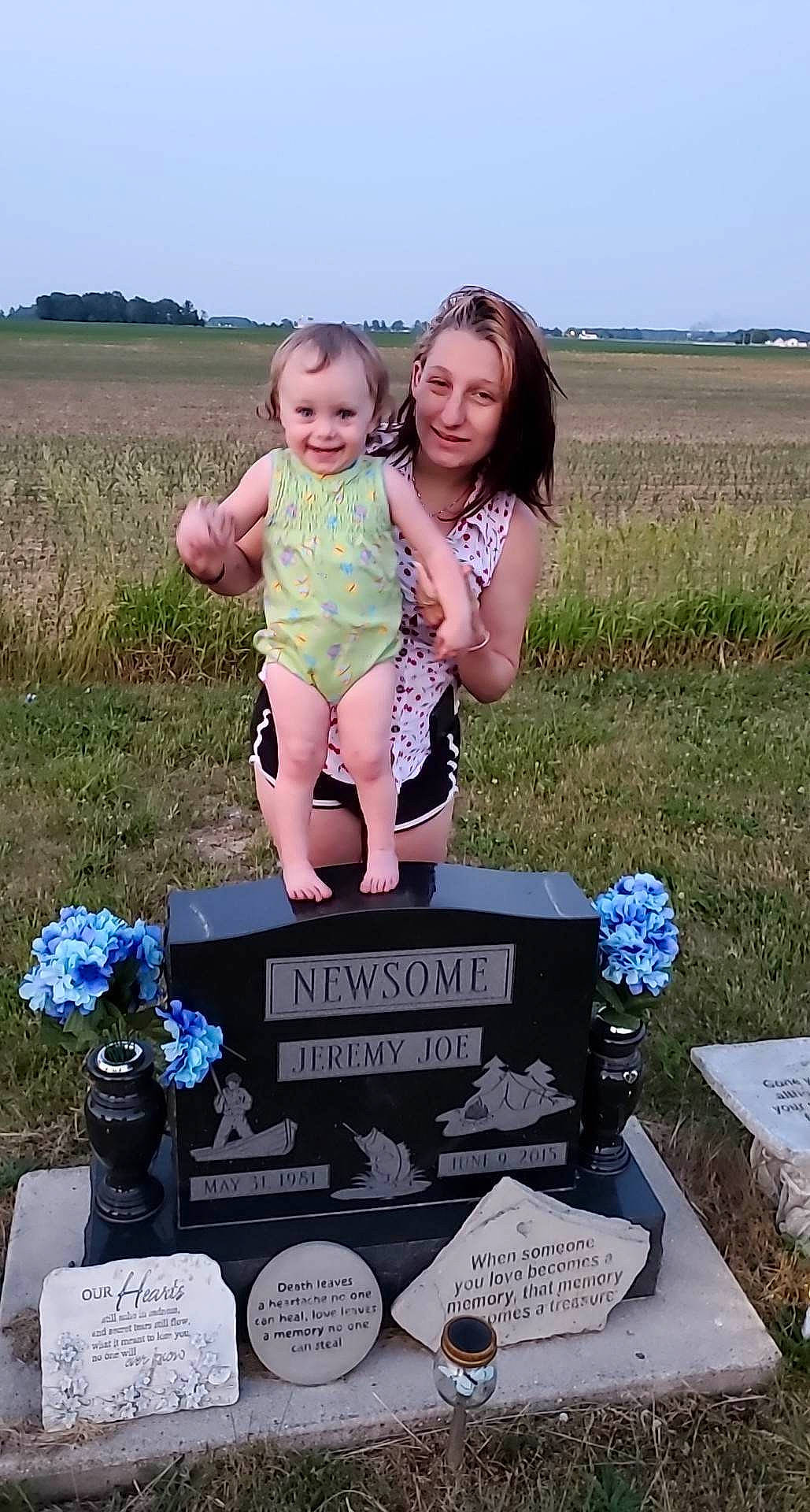 Renesimae joined the competition — help win amazing prizes! baby, baby_toddler_clothing, cemetery, event, flower, fun, grass, grassland, grave, happy, headstone, joy, landscape, natural_environment, people_in_nature, person, photograph, plant, prairie, sky