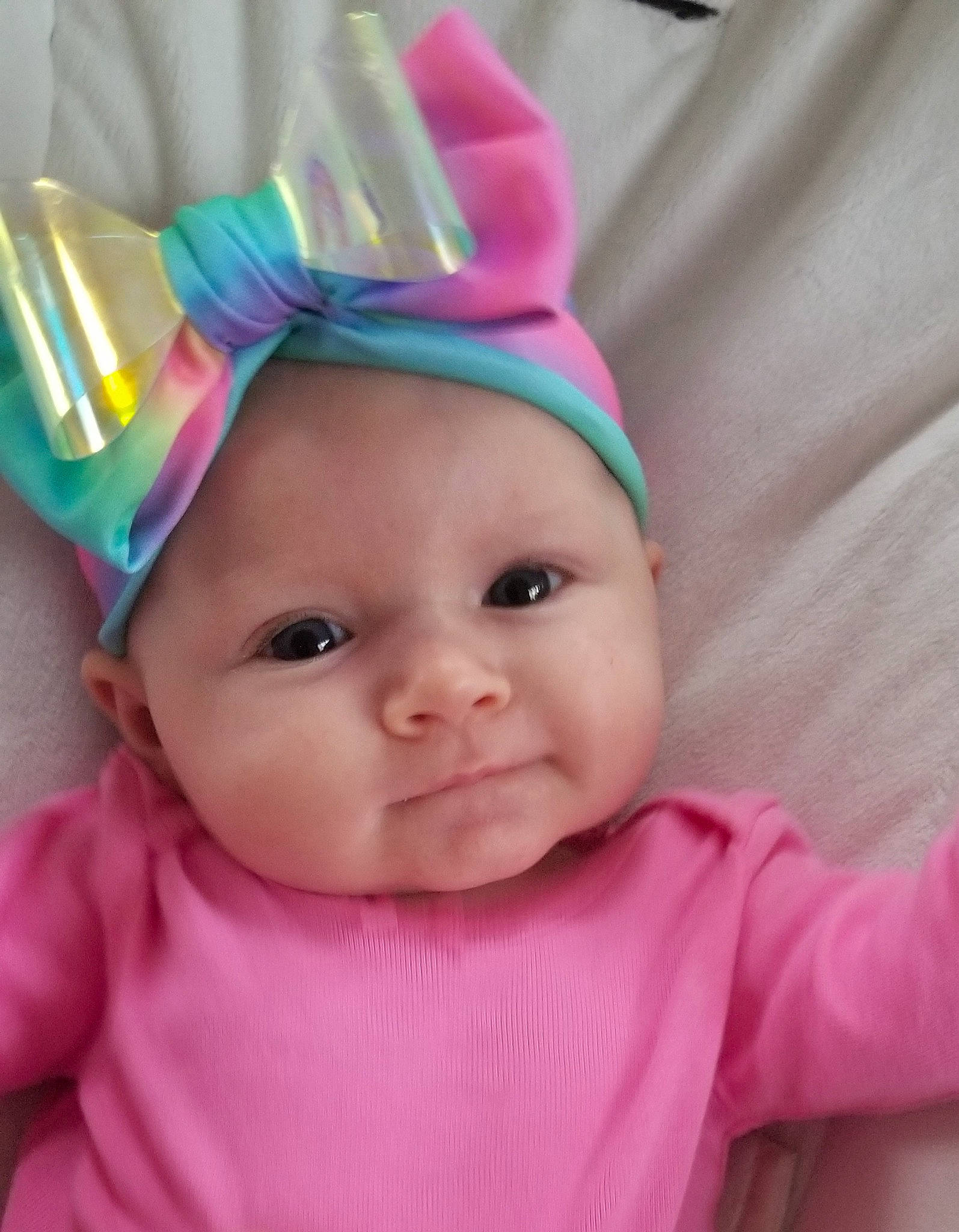 Zaylia is registered to the contest to win money with this photo: baby, cheek, child, fashion_accessory, hair_accessory, head, headgear, lip, person, pink, skin, toddler