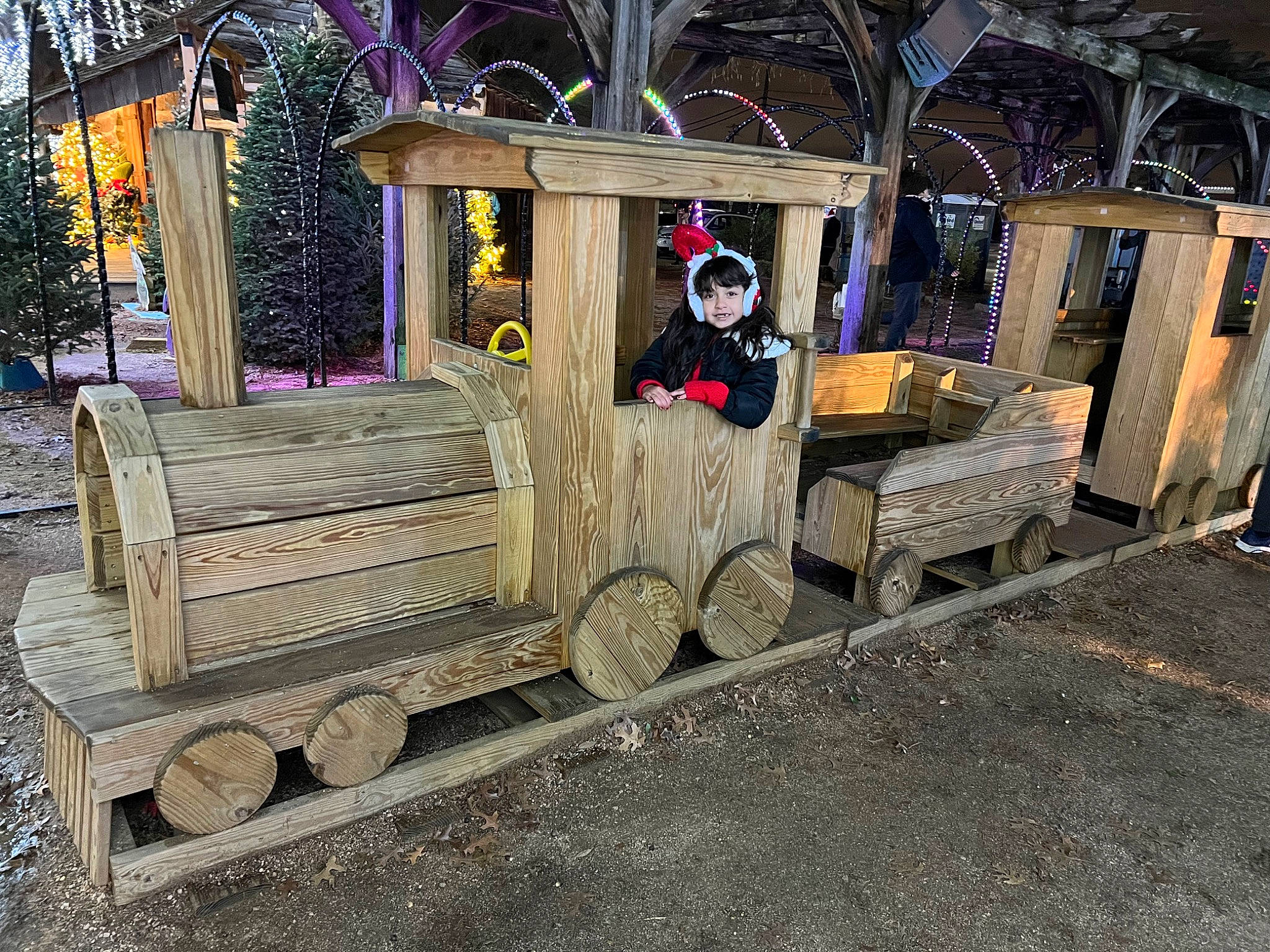 Natalie is registered to the contest to win money with this photo: asphalt, automotive_wheel_system, bench, city, classic, fun, joy, leisure, motor_vehicle, night, outdoor_structure, person, plant, recreation, road_surface, street, transport, tree, vehicle, wheel