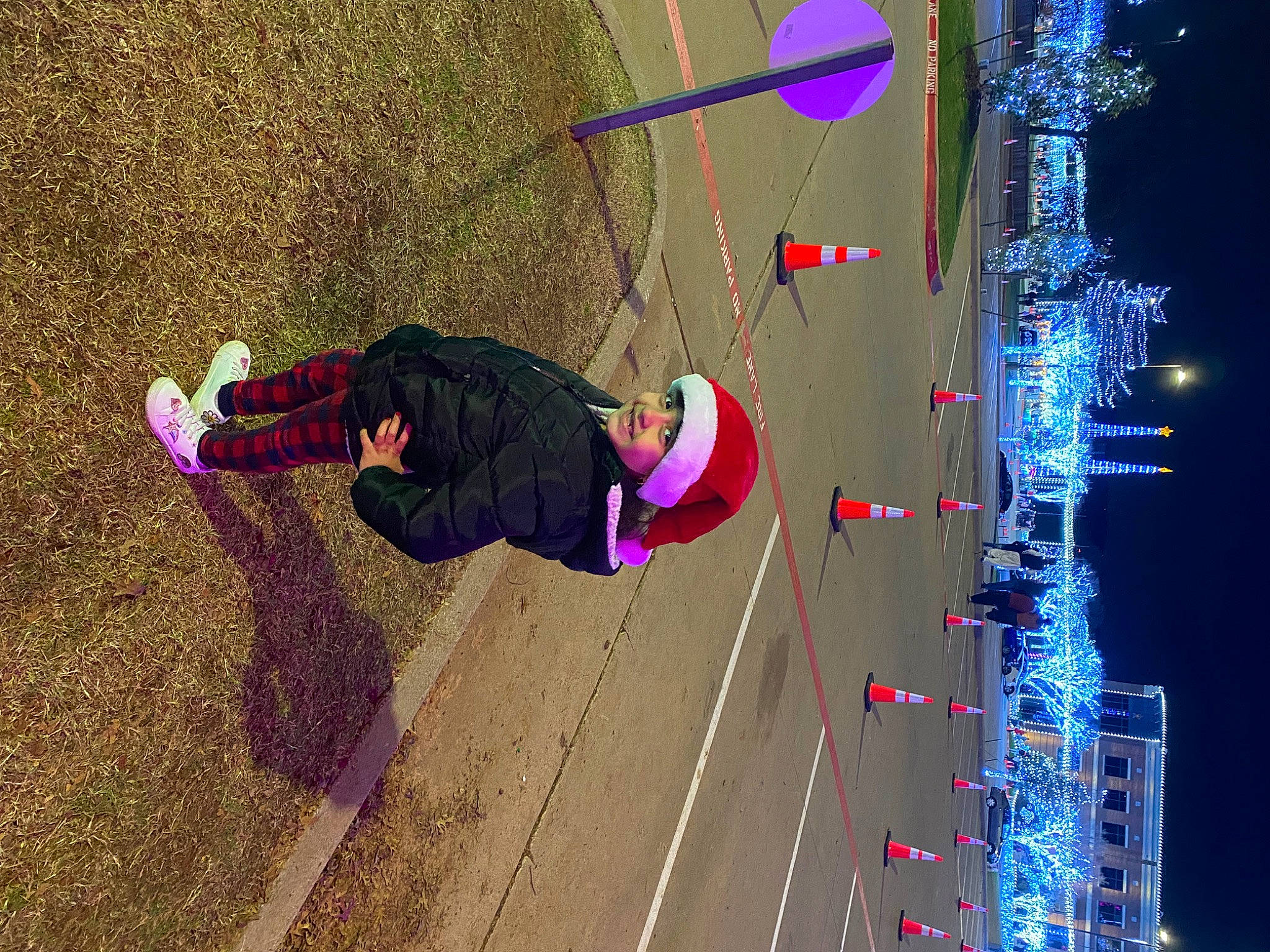 Natalie is registered to the contest to win money with this photo: adventure, electric_blue, electricity, extreme_sport, fun, headwear, helmet, joy, leisure, light, magenta, net, person, recreation, rope, shadow, sneakers, soil, sport_climbing, sport_venue