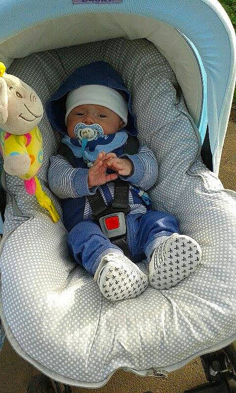 Filip is registered to the contest to win money with this photo: baby, baby_products, car_seat, child, comfort, headwear, joy, person, toy