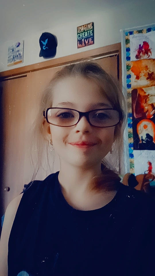 Evelyn is registered to the contest to win money with this photo: art, bangs, blue, cheek, chin, cool, eyebrow, eyelash, eyewear, facial_expression, forehead, glasses, happy, jaw, joy, lip, mouth, nose, person, picture_frame