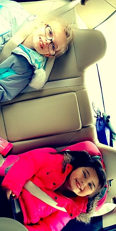 Evelyn is registered to the contest to win money with this photo: beauty, car_seat, car_seat_cover, child, comfort, cool, eyewear, fashion, happy, head_restraint, joy, leg, mammal, person, photograph, product, shoe, shorts, smile, snapshot