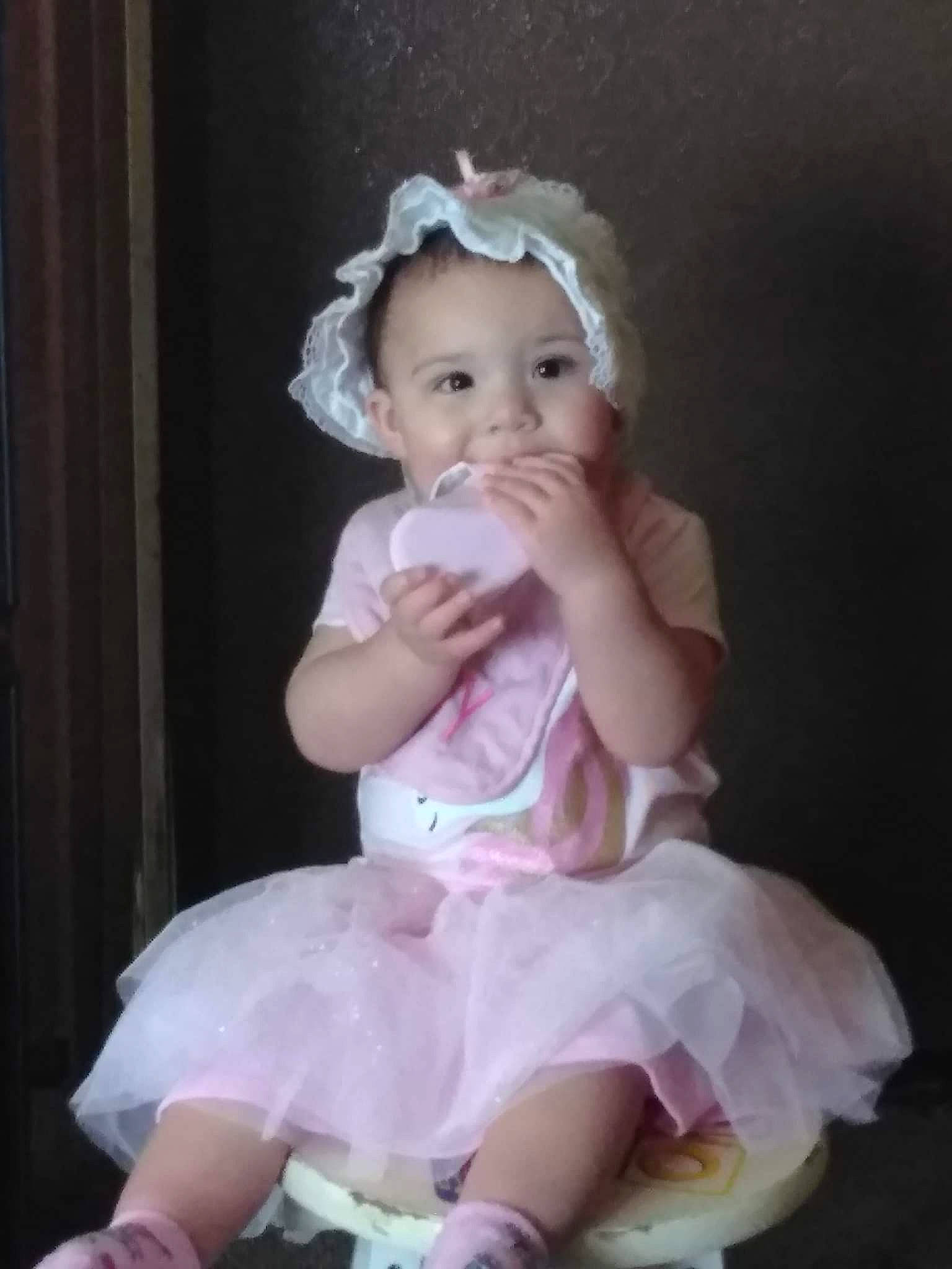 Heavenly is registered to the contest to win money with this photo: baby, baby_toddler_clothing, blond, cheek, curtain, day_dress, dress, embellishment, fashion_accessory, flash_photography, fun, head, headband, headpiece, iris, lip, person, pink, skin, toddler