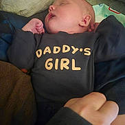 Renesmee joined the competition — help win amazing prizes! baby, blanket, child, clothing, cozy, cute, face, family, hand, infant, love, newborn, onesie, peaceful, person, portrait, rest, sleeping, soft, toddler