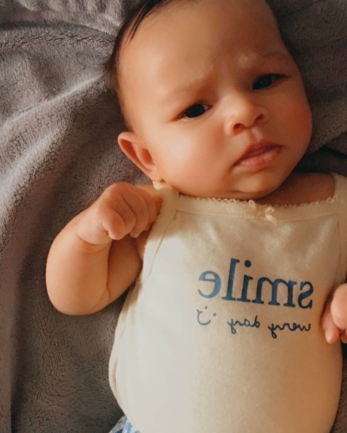 Kaia joined the competition — help win amazing prizes! baby, baby_toddler_clothing, cheek, chin, eye, eyebrow, eyelash, face, finger, hand, happy, head, human_body, iris, lip, mouth, neck, nose, person, skin