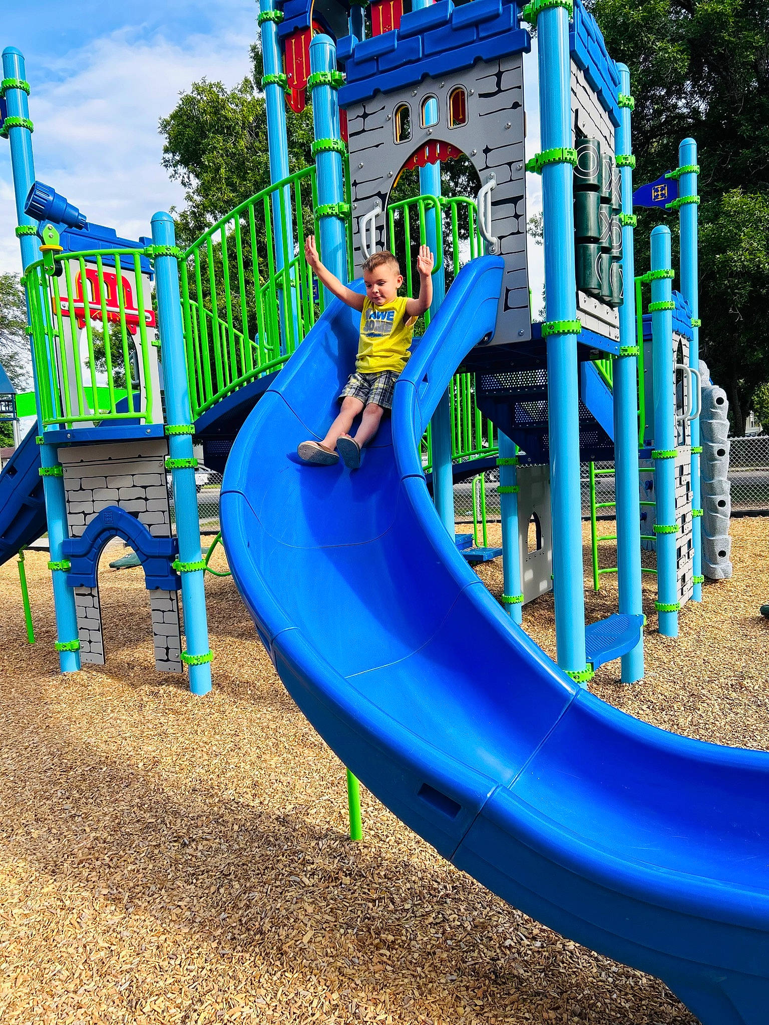 Cohen joined the competition — help win amazing prizes! aqua, chute, city, cloud, electric_blue, fun, grass, green, leisure, nonbuilding_structure, outdoor_play_equipment, outdoor_recreation, person, plant, play, playground, playground_slide, recreation, sky, toddler