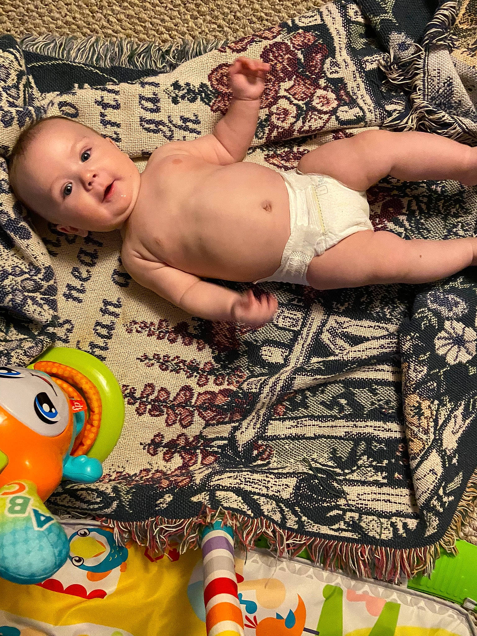 Jayden joined the competition — help win amazing prizes! abdomen, baby, baby_products, barefoot, chest, child, finger, flooring, foot, happy, human_leg, muscle, navel, pattern, person, smile, stomach, textile, thigh, toddler