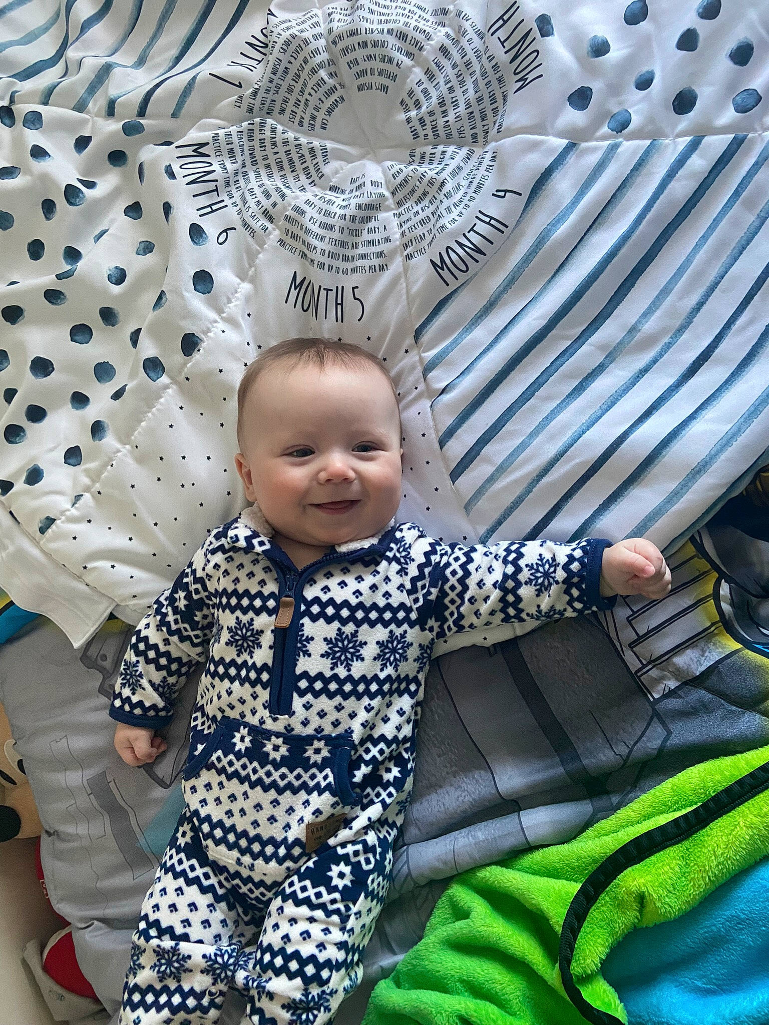 Jayden joined the competition — help win amazing prizes! baby, baby_toddler_clothing, black, blue, child, comfort, eye, fun, grass, happy, joy, leisure, pattern, people, person, photograph, sitting, sleeve, smile, snapshot