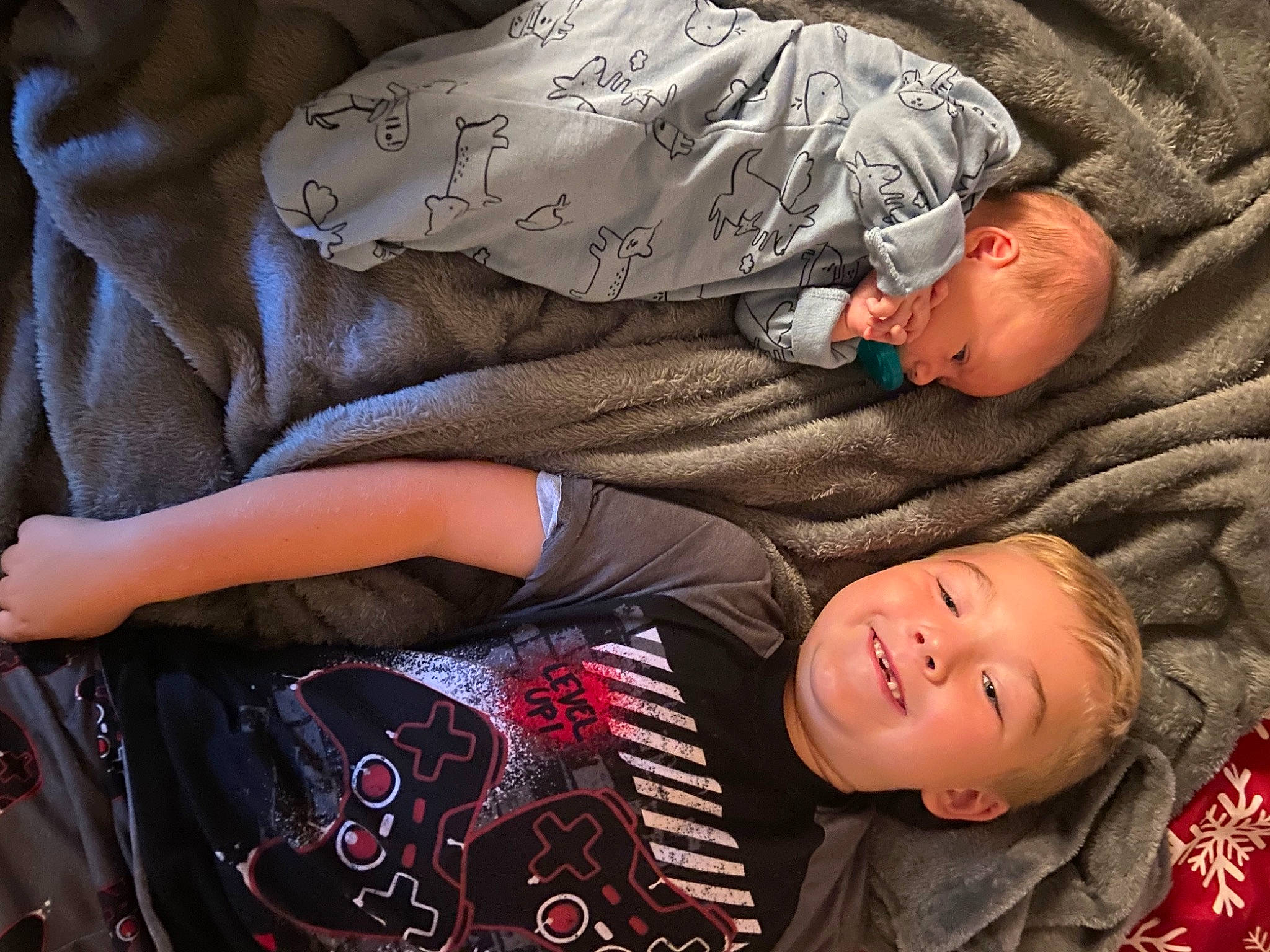 Jaxson joined the competition — help win amazing prizes! baby, baby_products, baby_toddler_clothing, child, comfort, cool, flesh, gesture, hand, happy, hat, joy, linens, nap, pattern, person, sitting, sleep, sleeve, smile