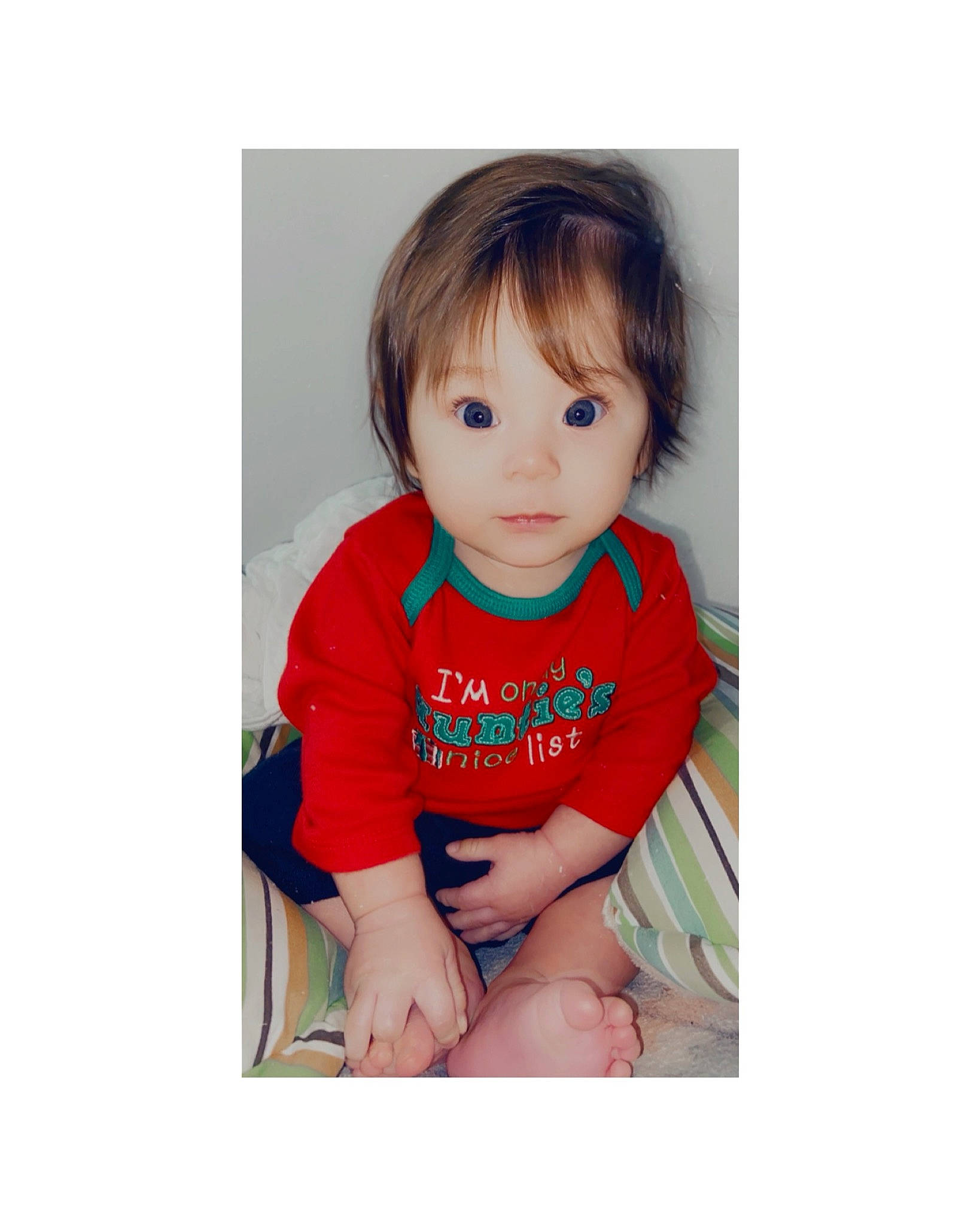 Anastasia is registered to the contest to win money with this photo: arm, baby, baby_toddler_clothing, bangs, brown_hair, dress, eyelash, face, font, hair, hand, happy, iris, peach, person, shorts, sleeve, smile, t_shirt, thigh
