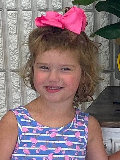 Brynlee is registered to the contest to win money with this photo: beauty, blond, child, costume_hat, ear, eye, eyelash, facial_expression, fun, hairstyle, happy, headband, headpiece, iris, joy, magenta, people, person, pink, smile