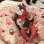 newborn, baby, infant, velvet_clothing, lace, pillow, owl_pattern, hospital_wristband, hand, foot, sleeping, cozy, blanket, indoors, cute, resting, soft_lighting, child, portrait, peaceful