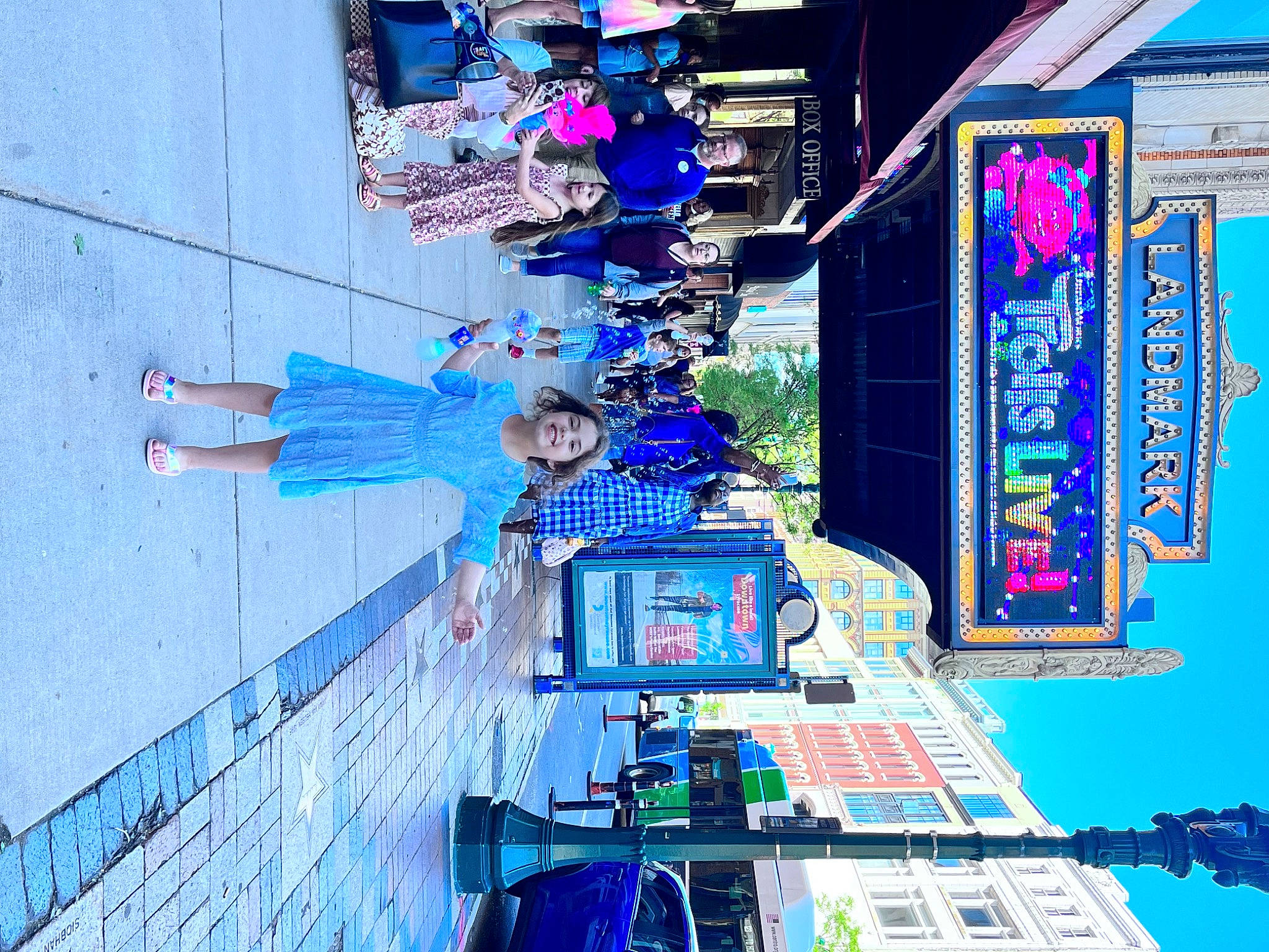 Piper is registered to the contest to win money with this photo: architecture, azure, blue, building, city, daytime, electric_blue, electricity, engineering, facade, joy, light, line, metropolis, person, red, sky, space, urban_area, urban_design