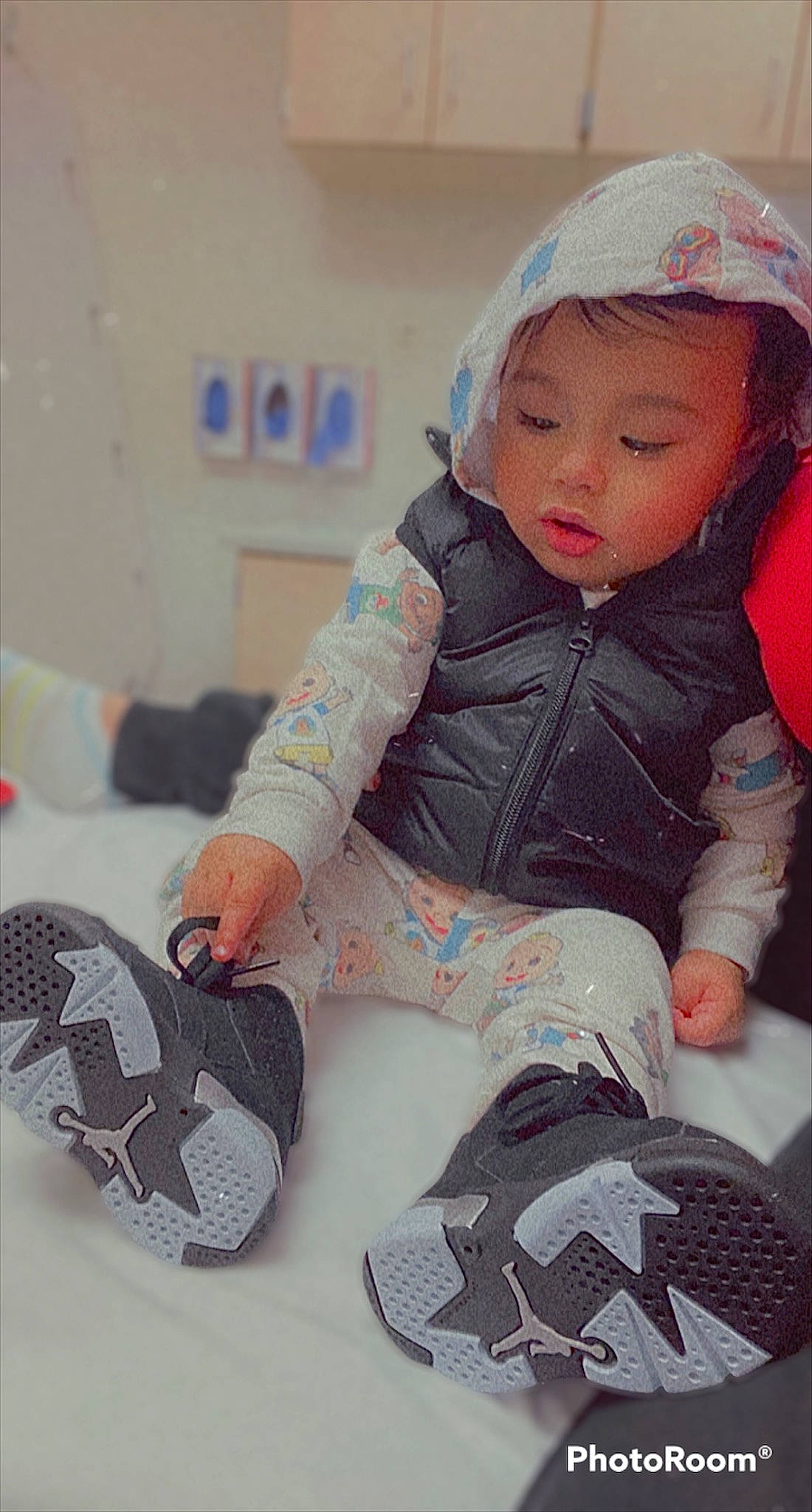 Jhair joined the competition — help win amazing prizes! baby_toddler_clothing, beanie, cap, carmine, child, cool, fashion_accessory, fun, headwear, hoodie, human_leg, knee, pattern, person, personal_protective_equipment, shoe, sitting, sleeve, sneakers, sock