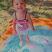 Willow joined the competition — help win amazing prizes! baby, backyard, clothing, face, grass, head, nature, outdoors, park, person, photography, plant, pool, portrait, shorts, summer, swimwear, tree, water, yard