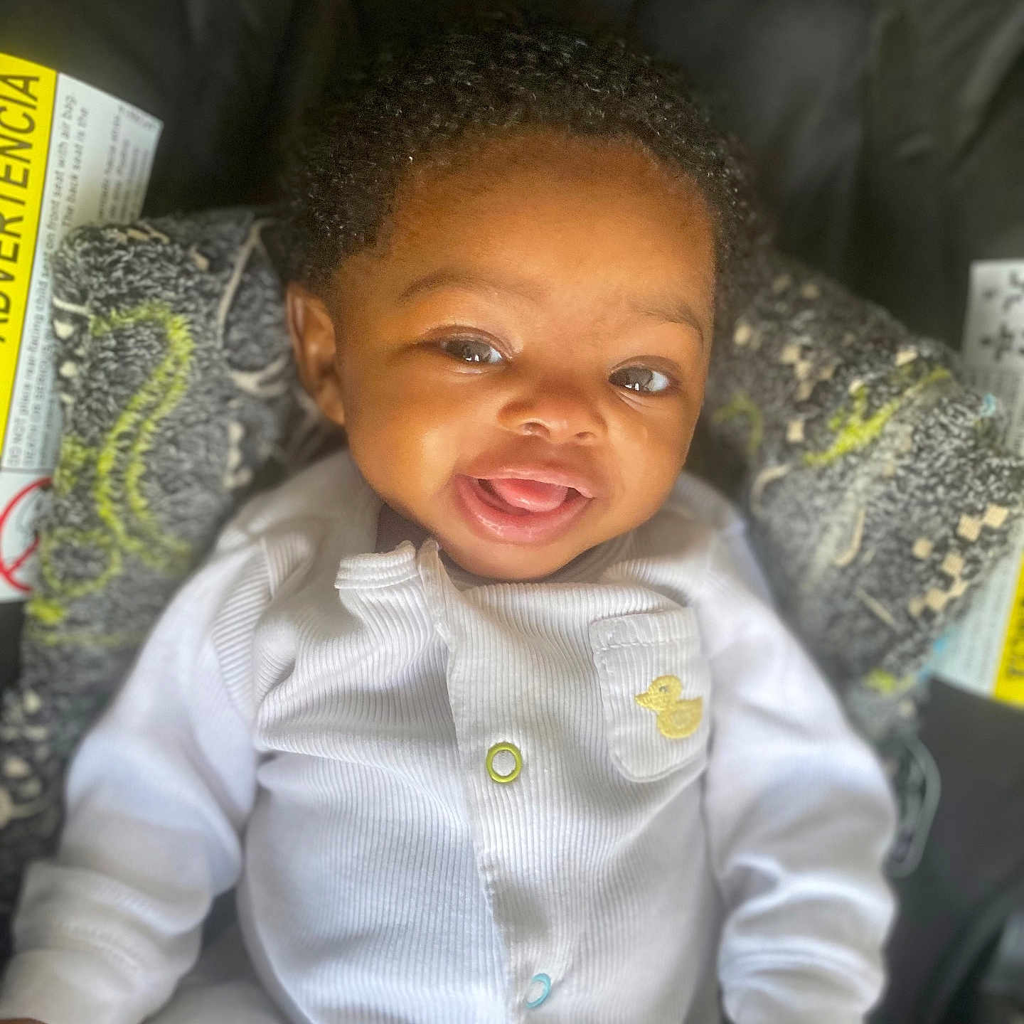 Thema-Barbara joined the competition — help win amazing prizes! adorable, baby, blanket, car_seat, child, closeup, cozy, curly_hair, cute, expression, face, happy, indoor, infant, newborn, person, portrait, smiling, white_onesie, young_child