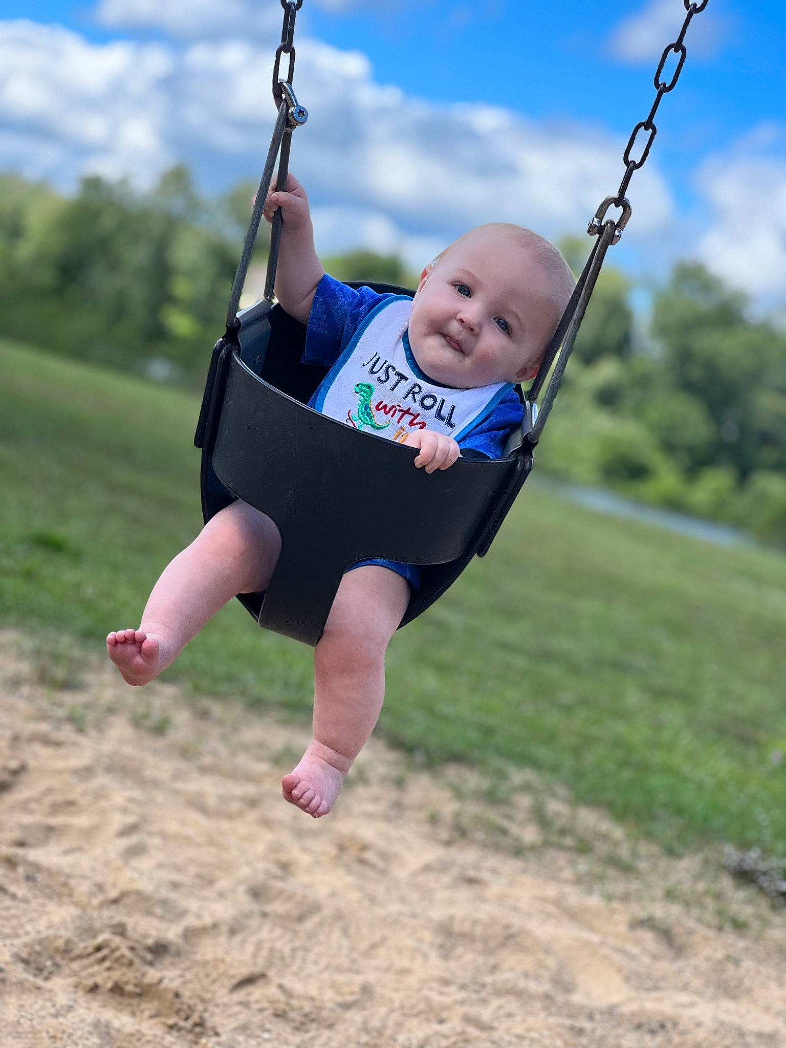 Dakota joined the competition — help win amazing prizes! baby_toddler_clothing, balance, child, city, cloud, electric_blue, event, fun, grass, happy, joy, leisure, outdoor_play_equipment, person, playground, recreation, rope, sky, smile, swing