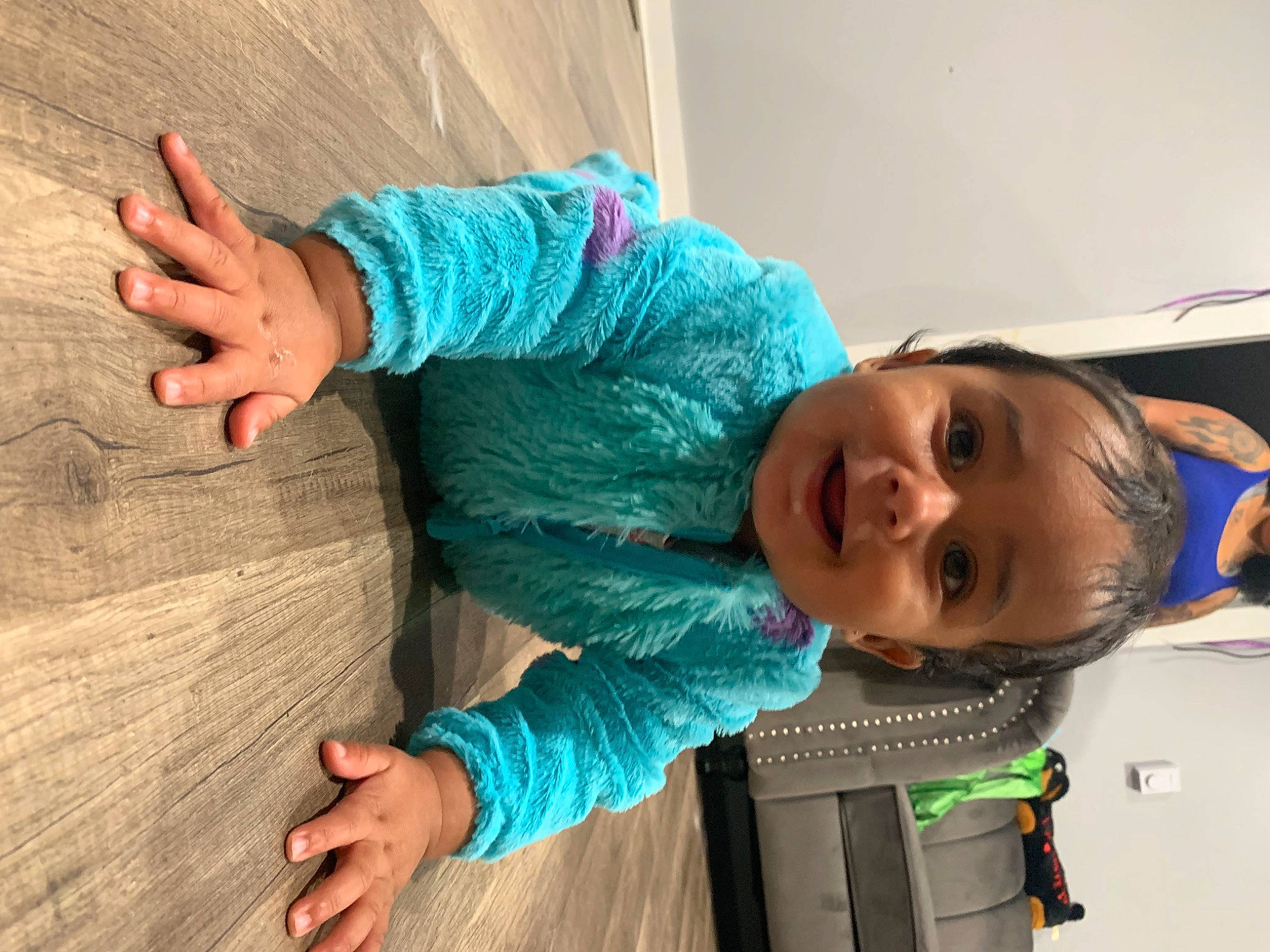 Angelo is registered to the contest to win money with this photo: arm, baby, baby_toddler_clothing, child, elbow, electric_blue, eye, face, hair, happy, head, human_body, joint, person, skin, sleeve, smile, standing, toddler, tree