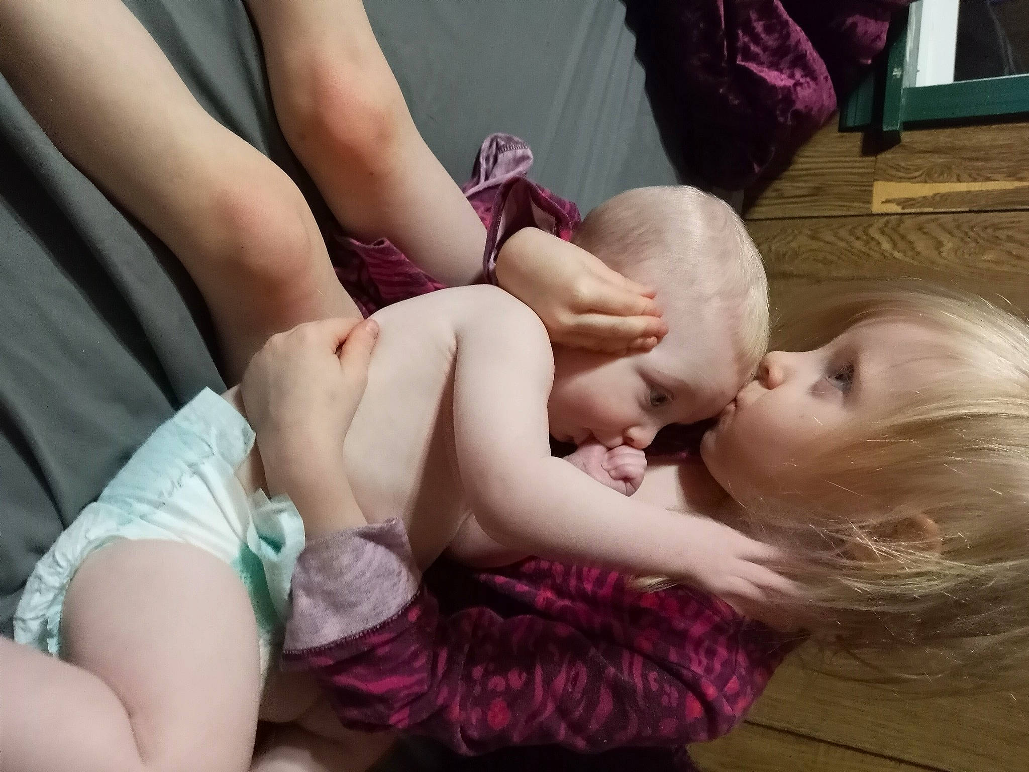 Anastasia is registered to the contest to win money with this photo: baby, chest, child, comfort, eyelash, finger, fun, gesture, happy, head, human_body, joint, knee, leg, person, picture_frame, pink, shoulder, skin, thigh