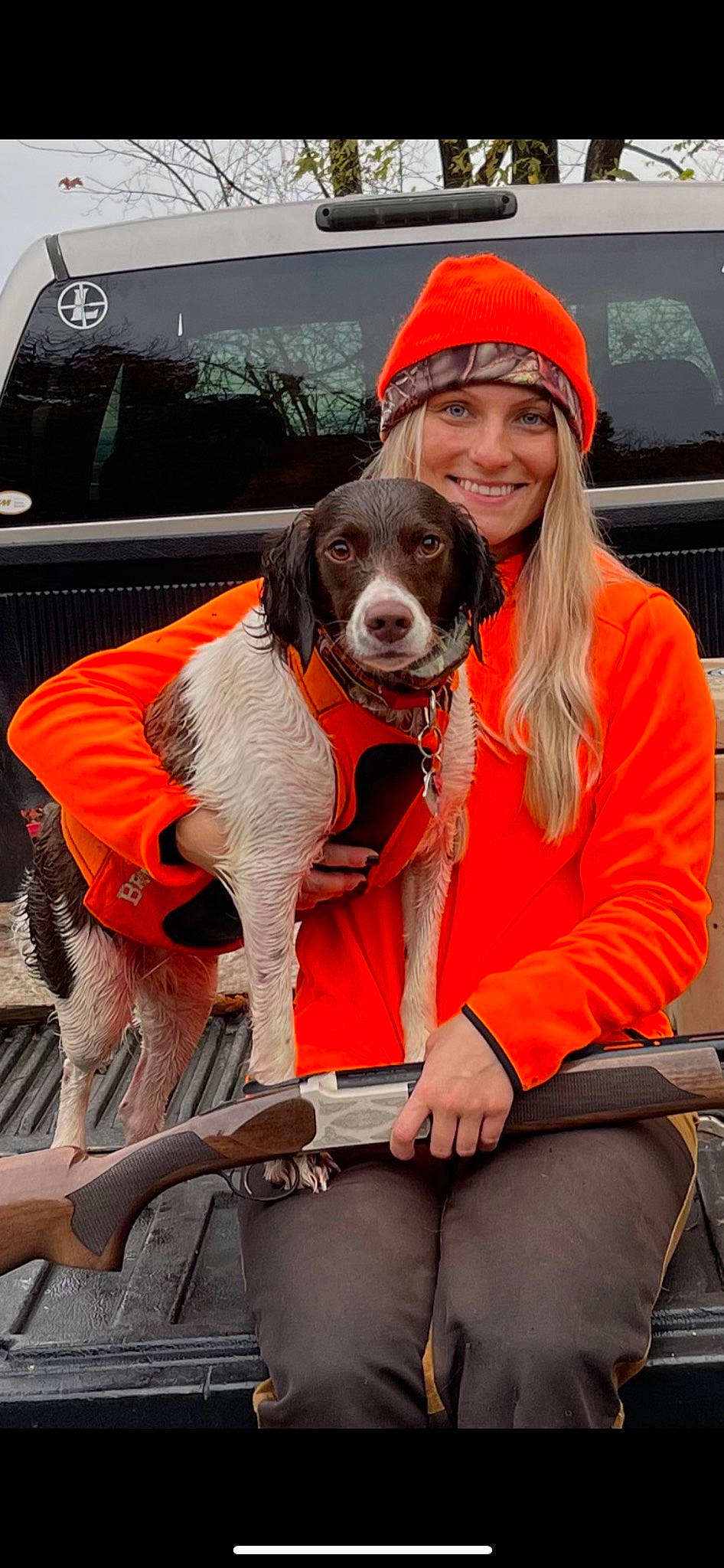 Daisy joined the competition — help win amazing prizes! automotive_exterior, baseball_cap, cap, carnivore, companion_dog, dog, dog_breed, dog_collar, fawn, fur, hat, leash, leisure, orange, recreation, smile, sporting_group, street_fashion, vehicle, vehicle_door