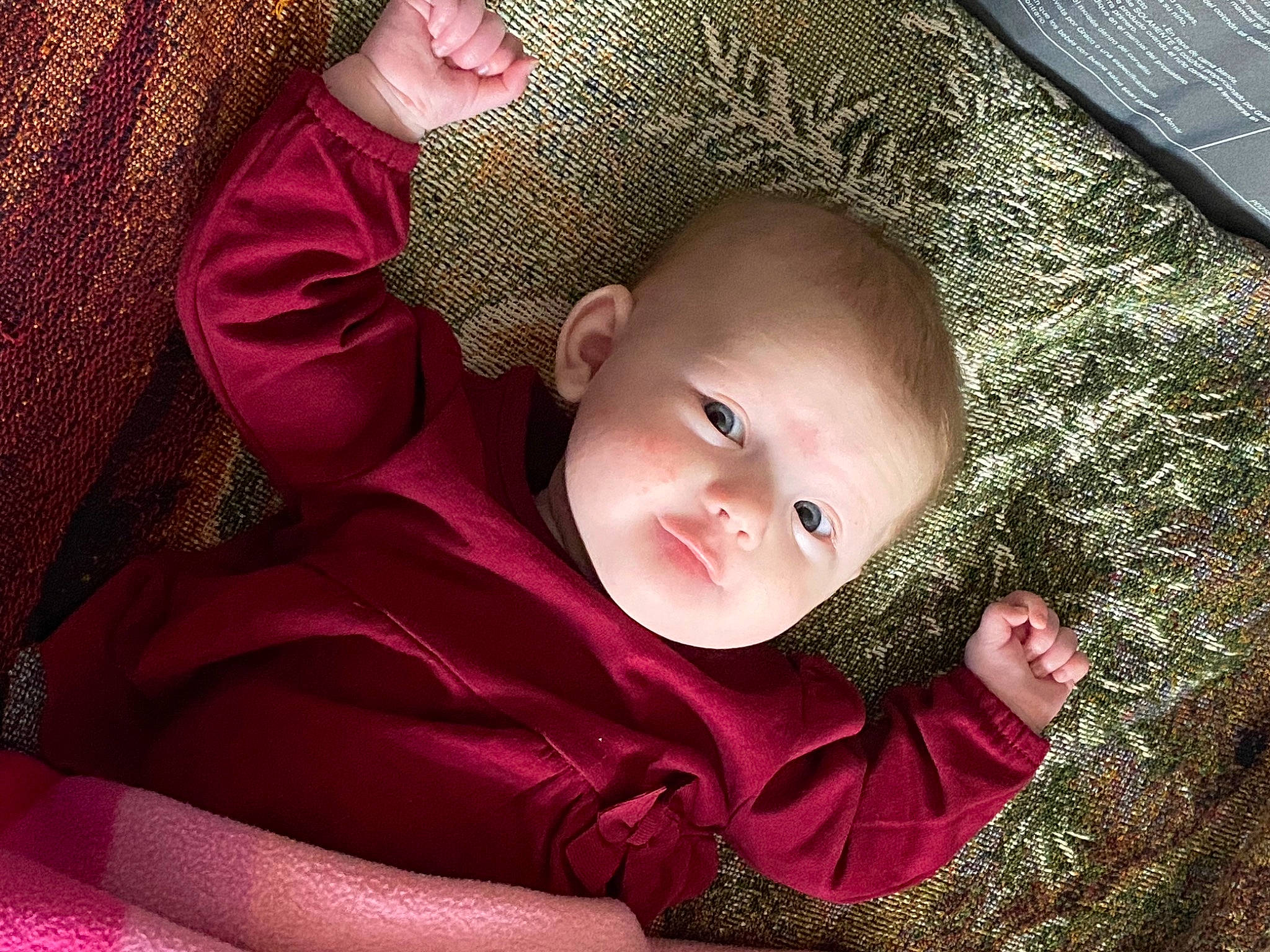 Kyra is registered to the contest to win money with this photo: baby, baby_toddler_clothing, cheek, child, comfort, eye, fun, grass, happy, head, iris, linens, mammal, mouth, nose, person, skin, sleeve, textile, toddler