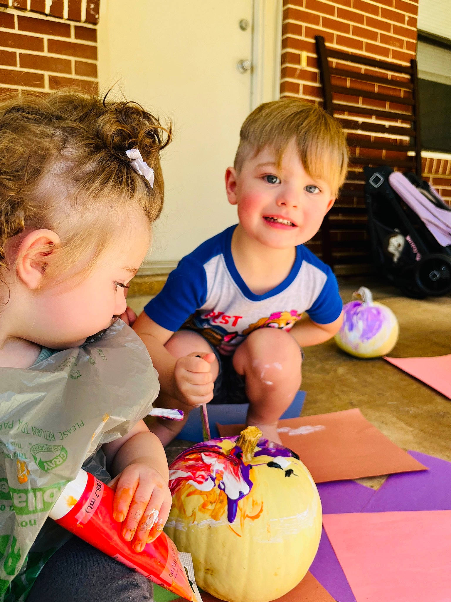 Phoenix joined the competition — help win amazing prizes! baby, baby_toddler_clothing, calabaza, child, cucurbita, event, facial_expression, flooring, fun, gourd, happy, joy, leisure, natural_foods, person, pumpkin, sitting, smile, squash, toddler