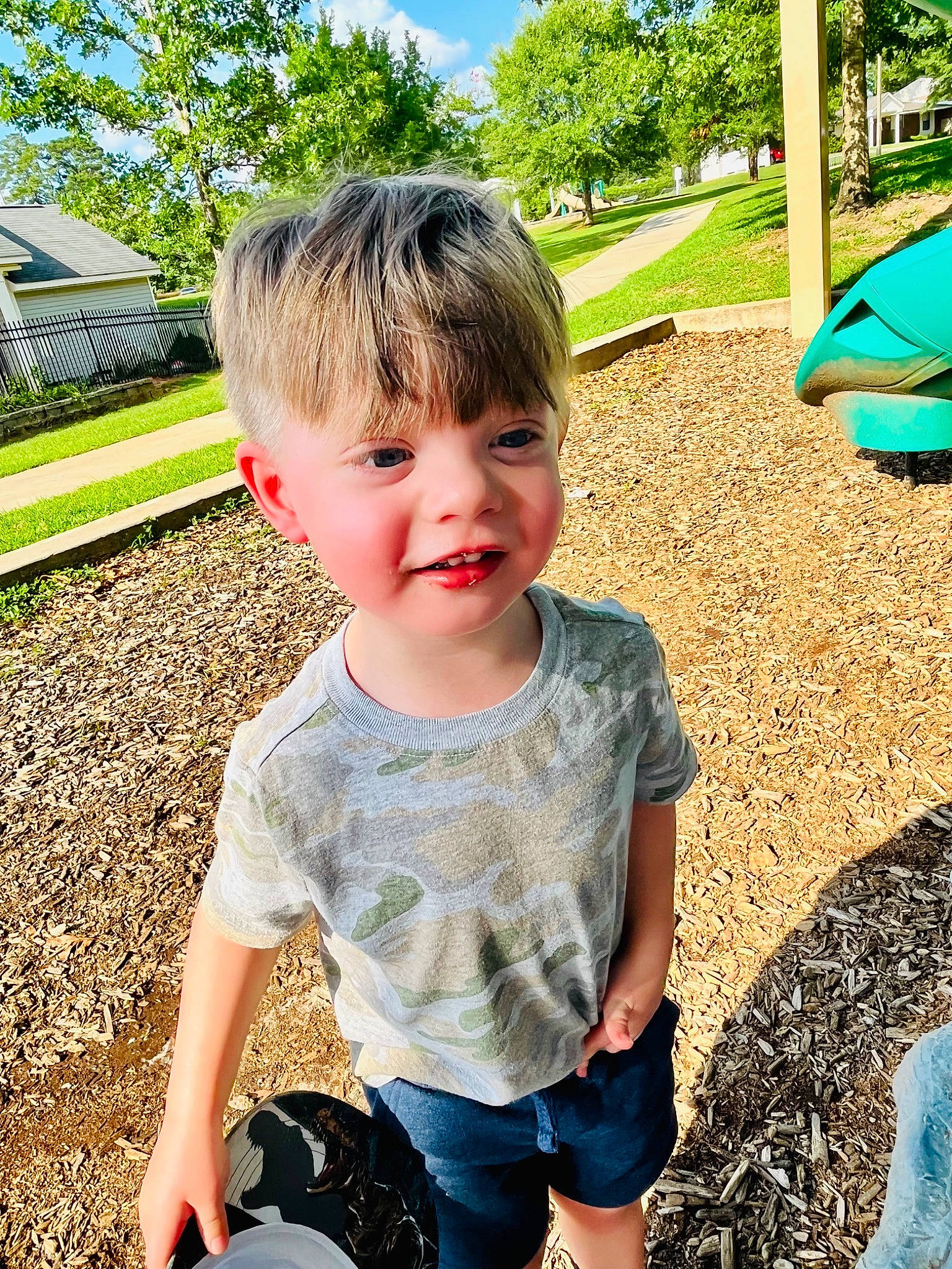 Ian is registered to the contest to win money with this photo: baby_toddler_clothing, blue, botany, child, cool, fun, grass, green, hairstyle, happy, lawn, leisure, people, people_in_nature, person, plant, sky, smile, t_shirt, toddler