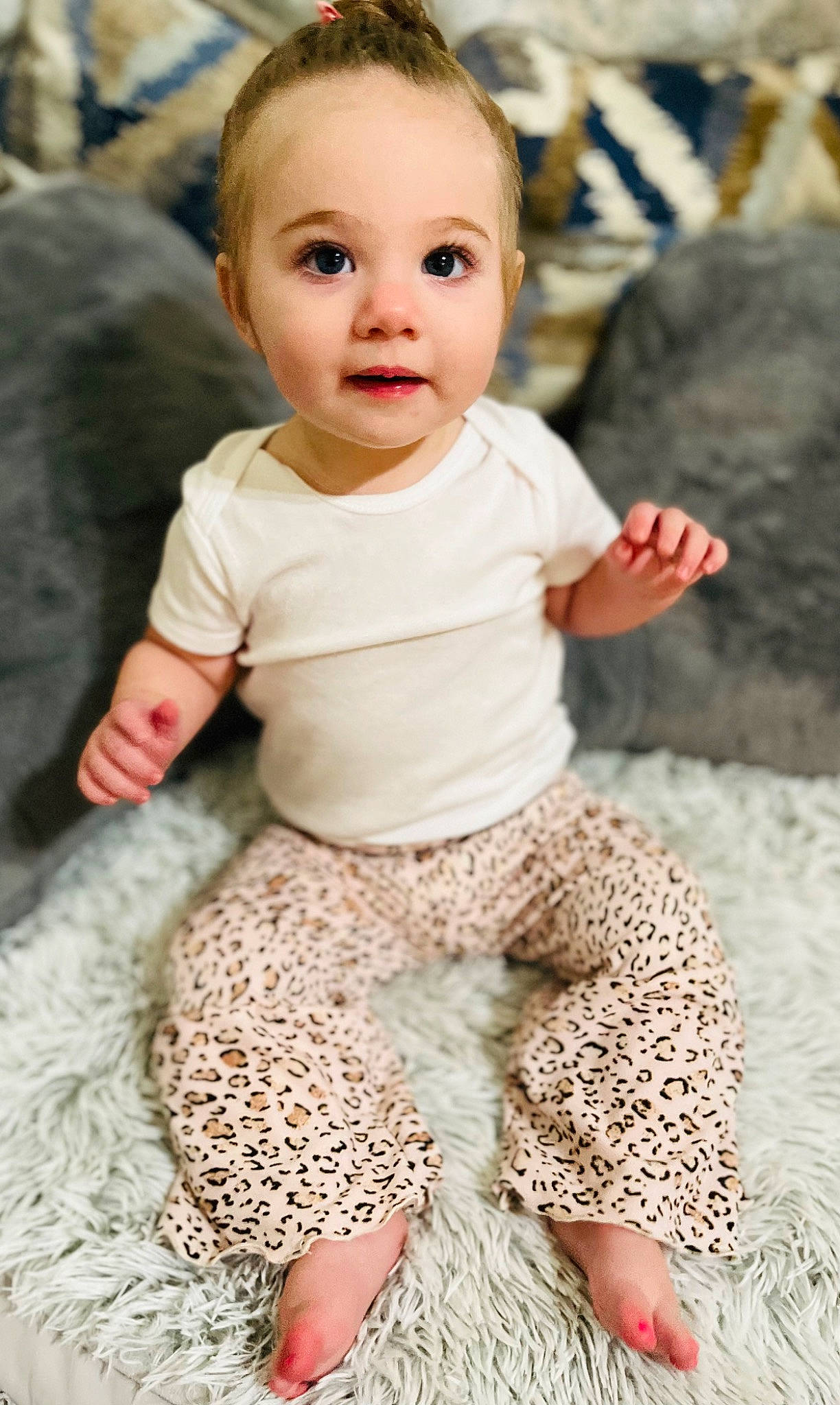 Ophelia is registered to the contest to win money with this photo: baby, baby_toddler_clothing, beauty, cheek, child, collar, eye, foot, happy, head, pattern, people, person, photograph, sitting, skin, sleeve, t_shirt, thigh, toddler