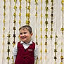 Arthur participe au concours pour gagner de l'argent avec cette photo : boy, celebration, cheeks, child, clothing, cute, decoration, formal_wear, gold_stars, hair, happy, indoor, party_backdrop, photography, portrait, red_vest, smile, standing, toddler, white_shirt