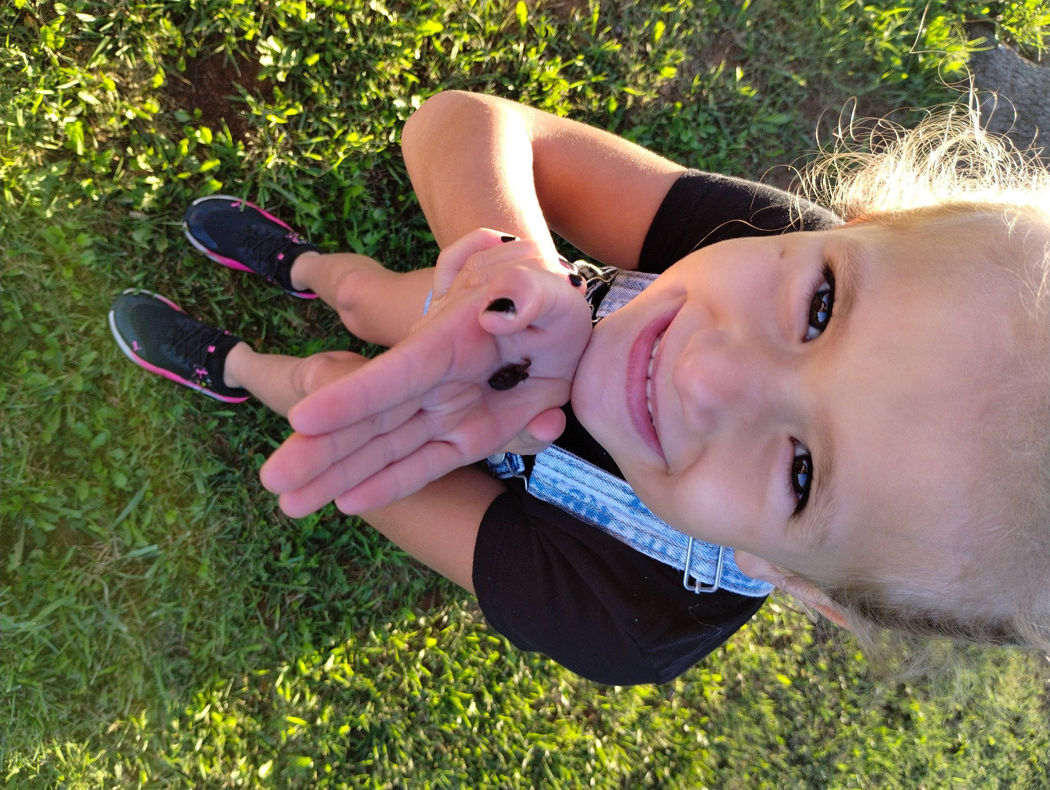 Camdyn is registered to the contest to win money with this photo: cool, eyelash, eyewear, finger, flash_photography, gesture, grass, grass_family, grassland, happy, joy, leisure, lip, meadow, mouth, neck, people_in_nature, person, plant, shoulder
