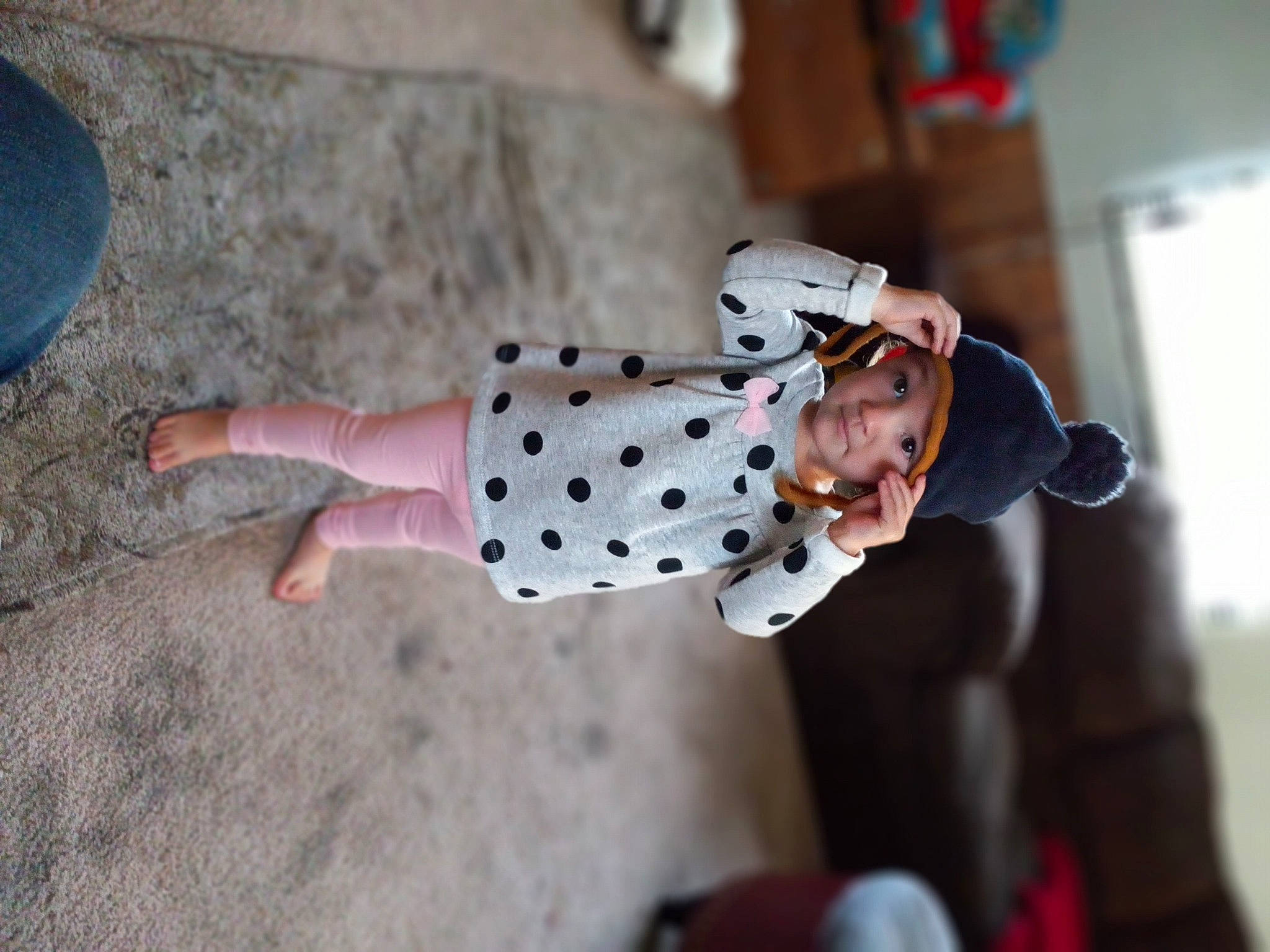 Myla is registered to the contest to win money with this photo: adventure, barefoot, carmine, child, climbing, entertainment, event, flooring, foot, fun, headwear, human_leg, leisure, mechanical_fan, pattern, person, recreation, sleeve, sports, street_fashion