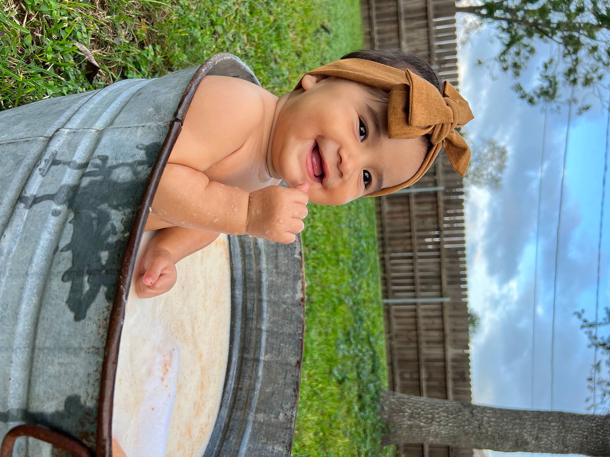 Ivey is registered to the contest to win money with this photo: automotive_tire, bicycle_tire, dress, eye, flash_photography, fun, grass, hairstyle, happy, headwear, joy, leaf, leisure, people_in_nature, person, plant, smile, spring, textile, tire